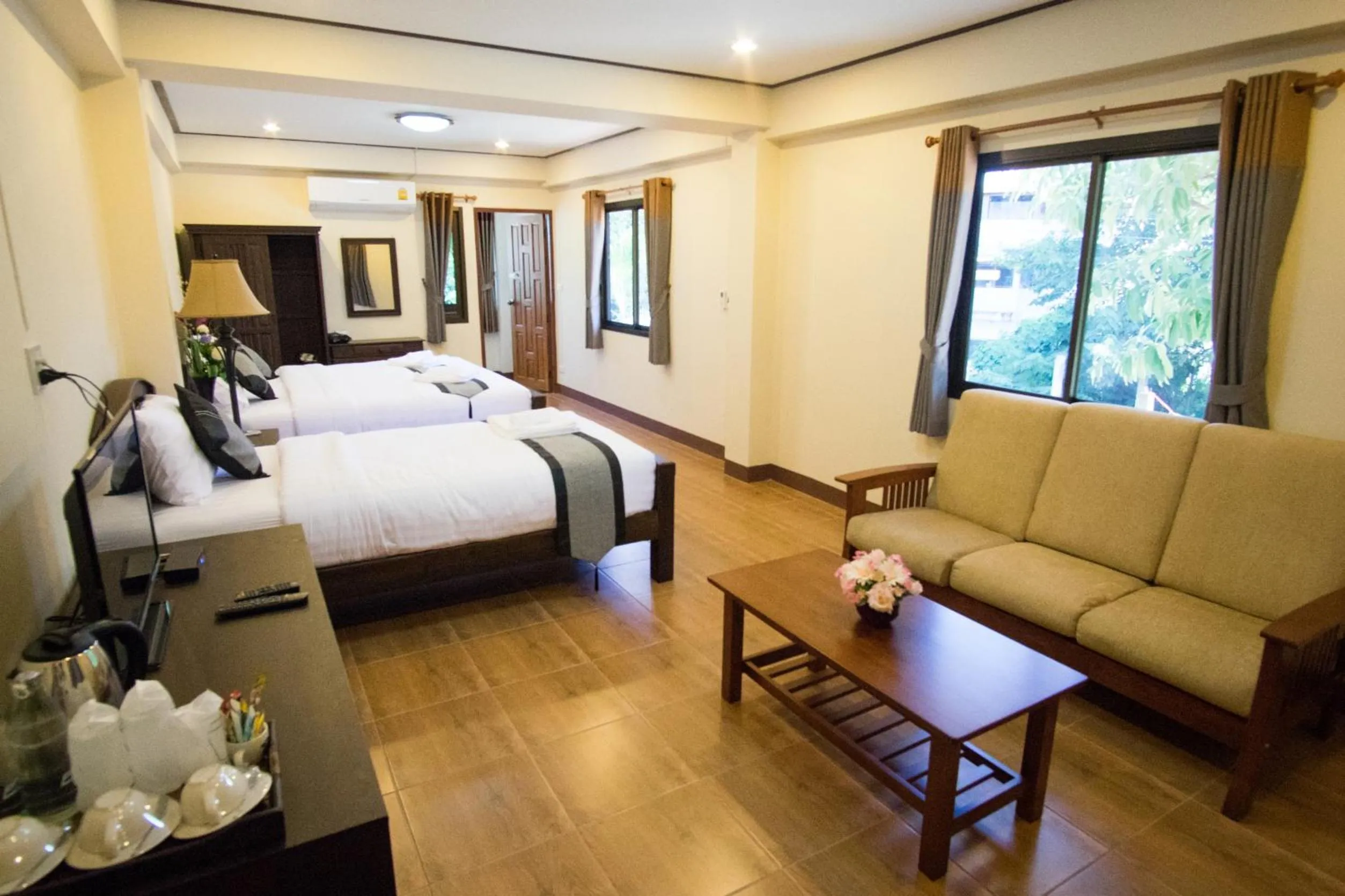 Bed in NanBaanKhun Hotel