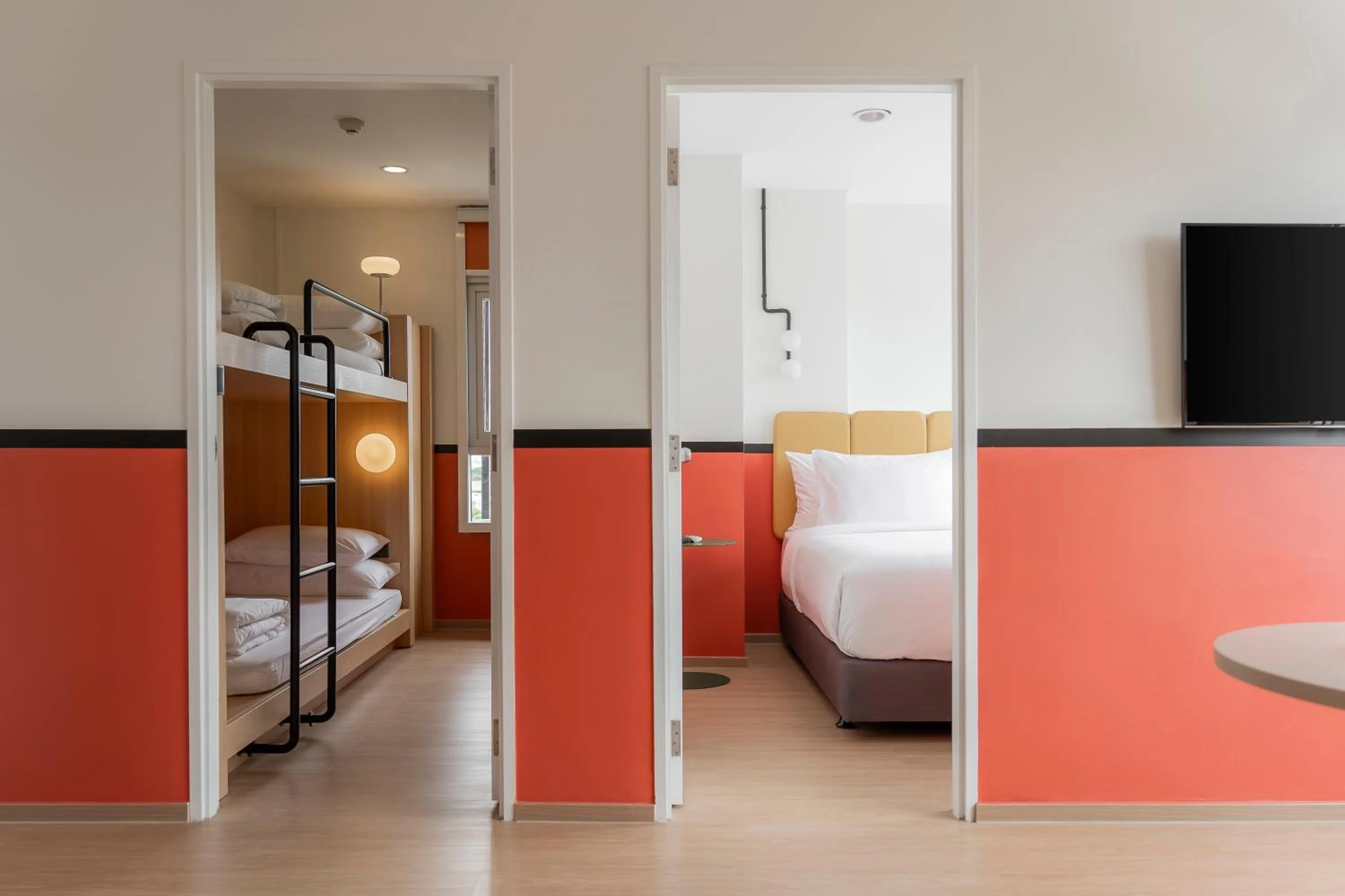 Bed in The Grass Serviced Suites