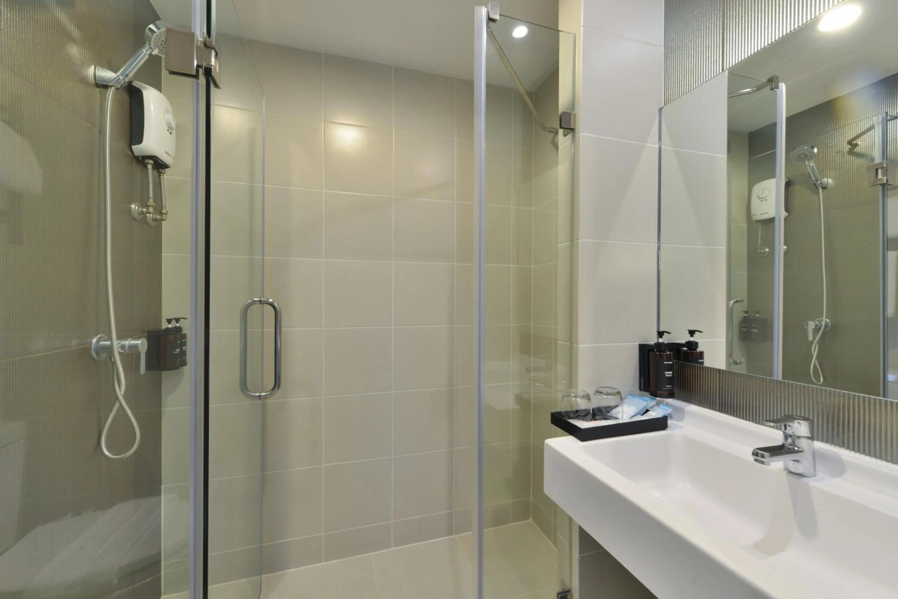 Shower in The Grass Serviced Suites