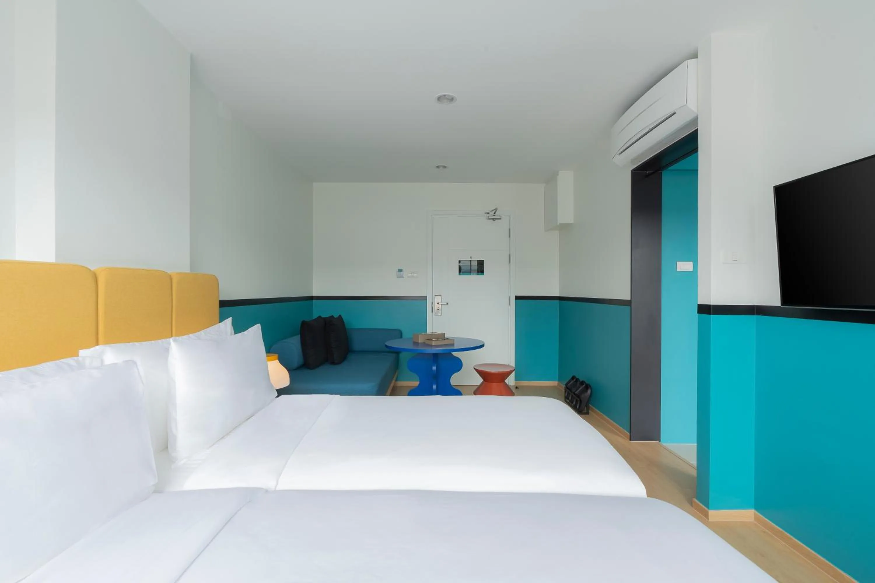 Bed in The Grass Serviced Suites