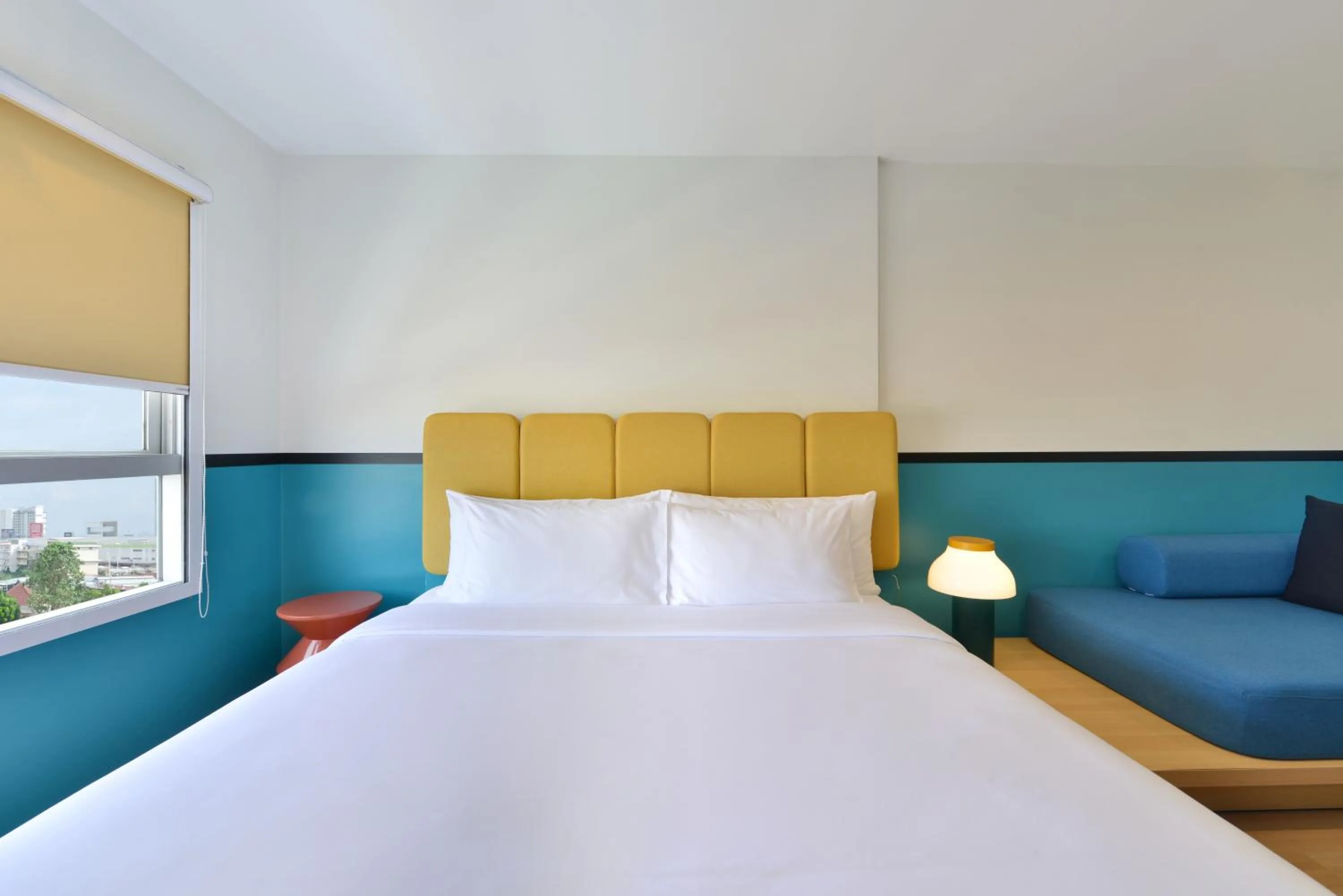 Bed in The Grass Serviced Suites