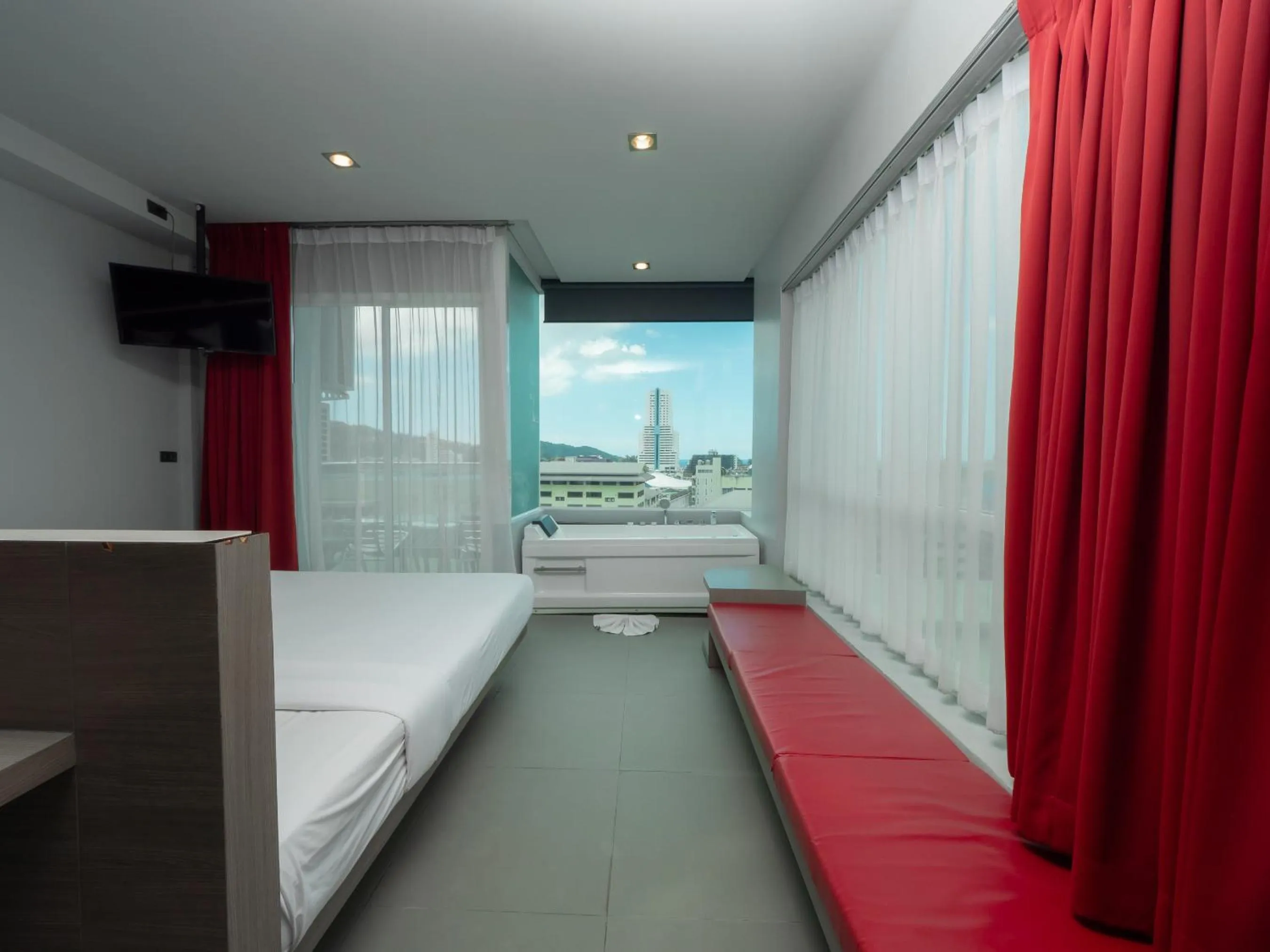 Photo of the whole room, Bed in At Patong Hotel - SHA Certified