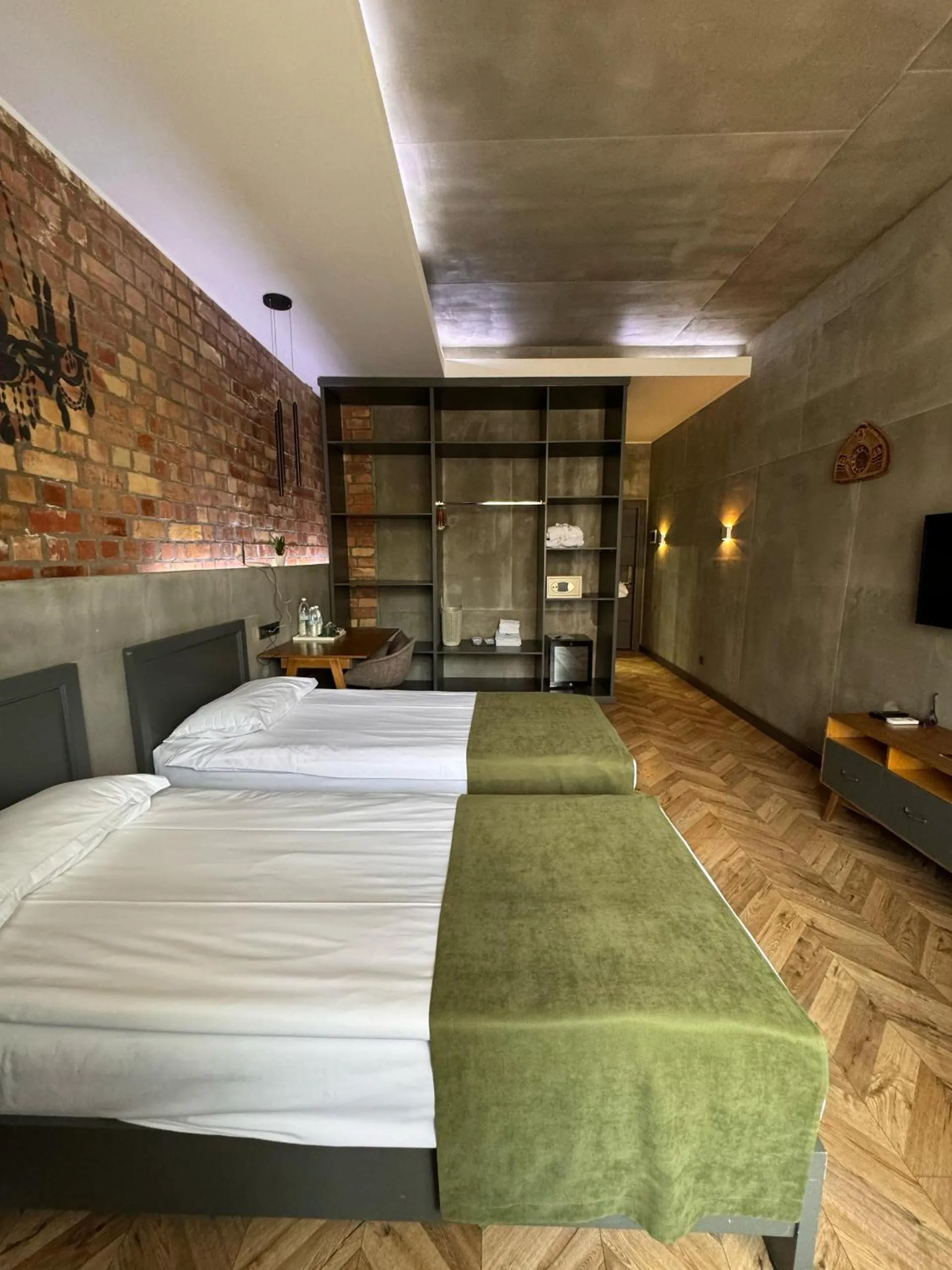 Photo of the whole room, Bed in Bugu Hotel Bishkek