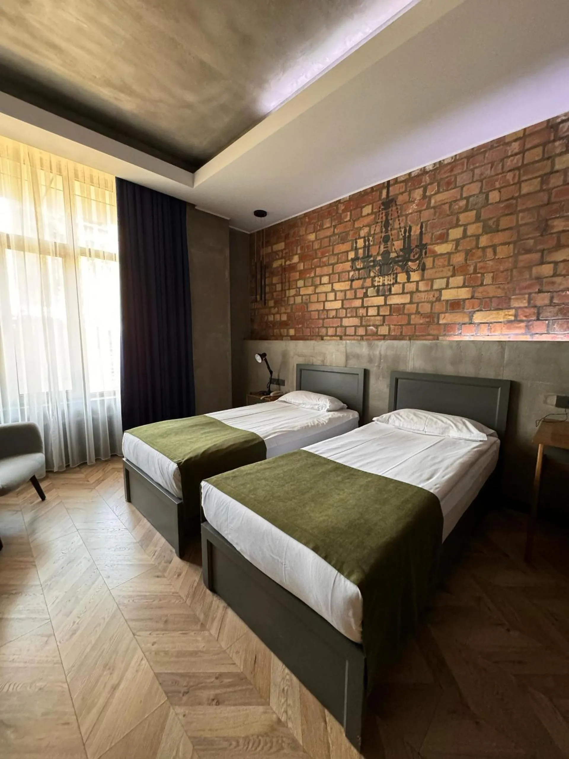 Bed in Bugu Hotel Bishkek