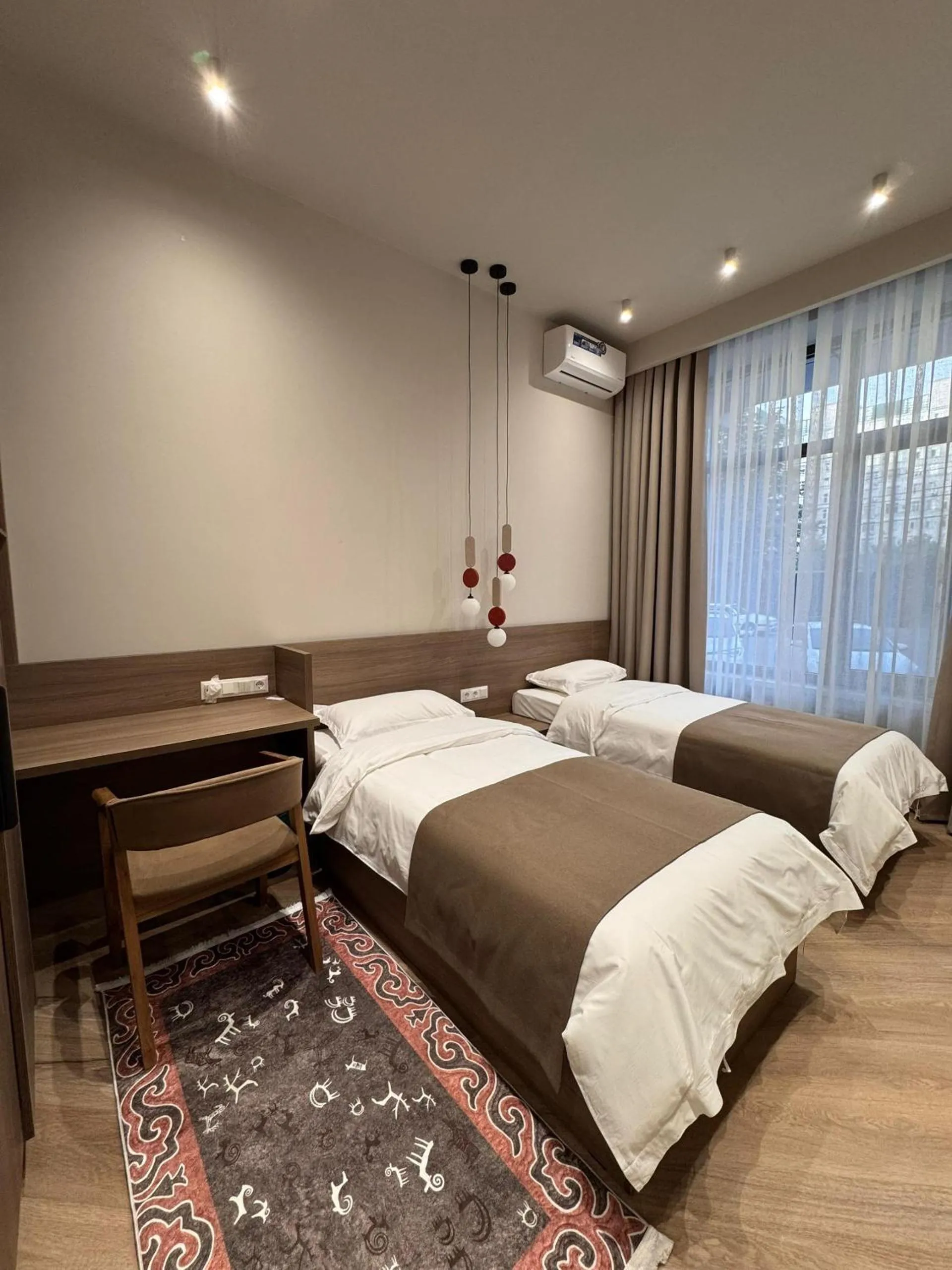 Bed in Bugu Hotel Bishkek