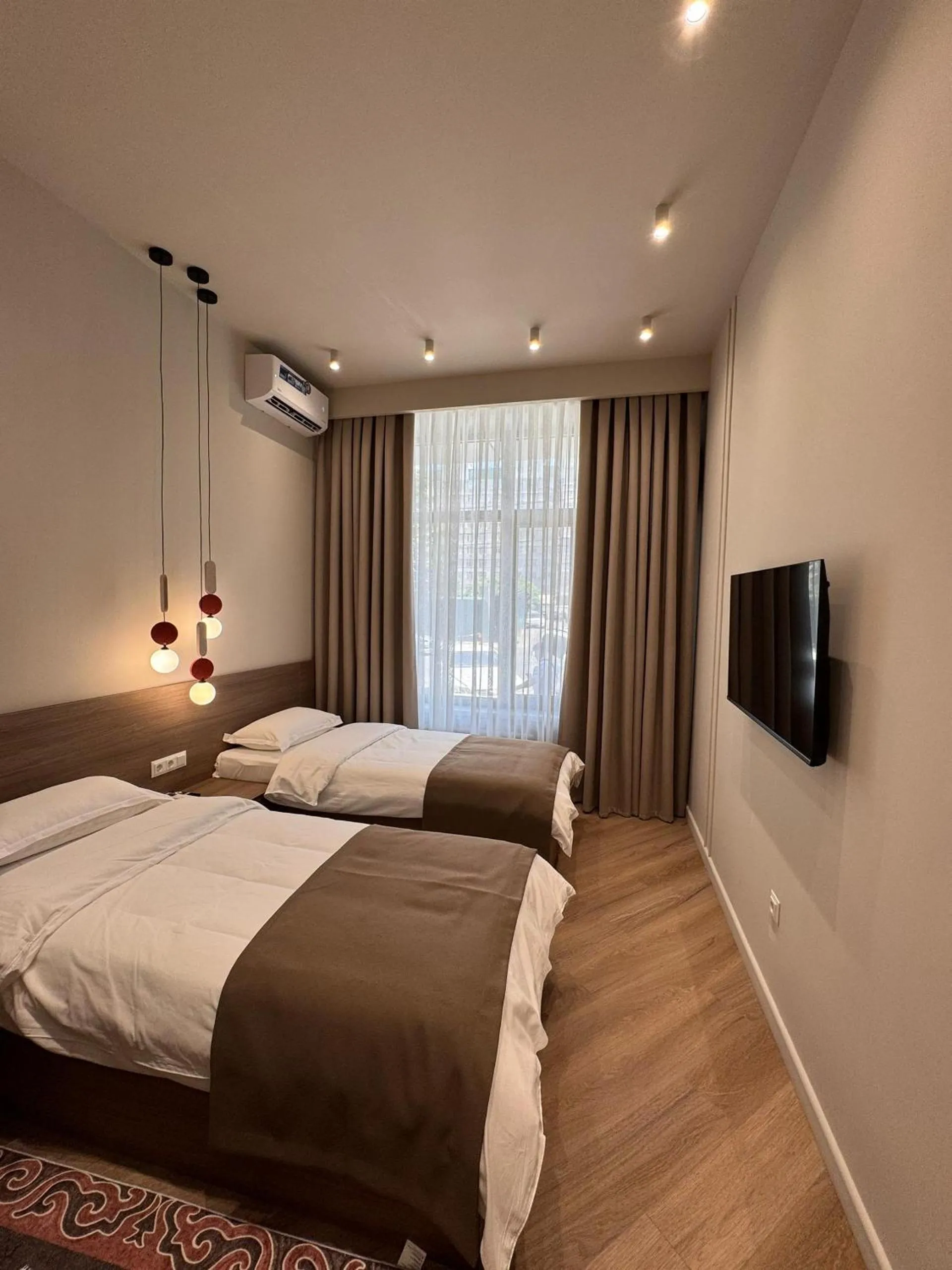 Bed in Bugu Hotel Bishkek