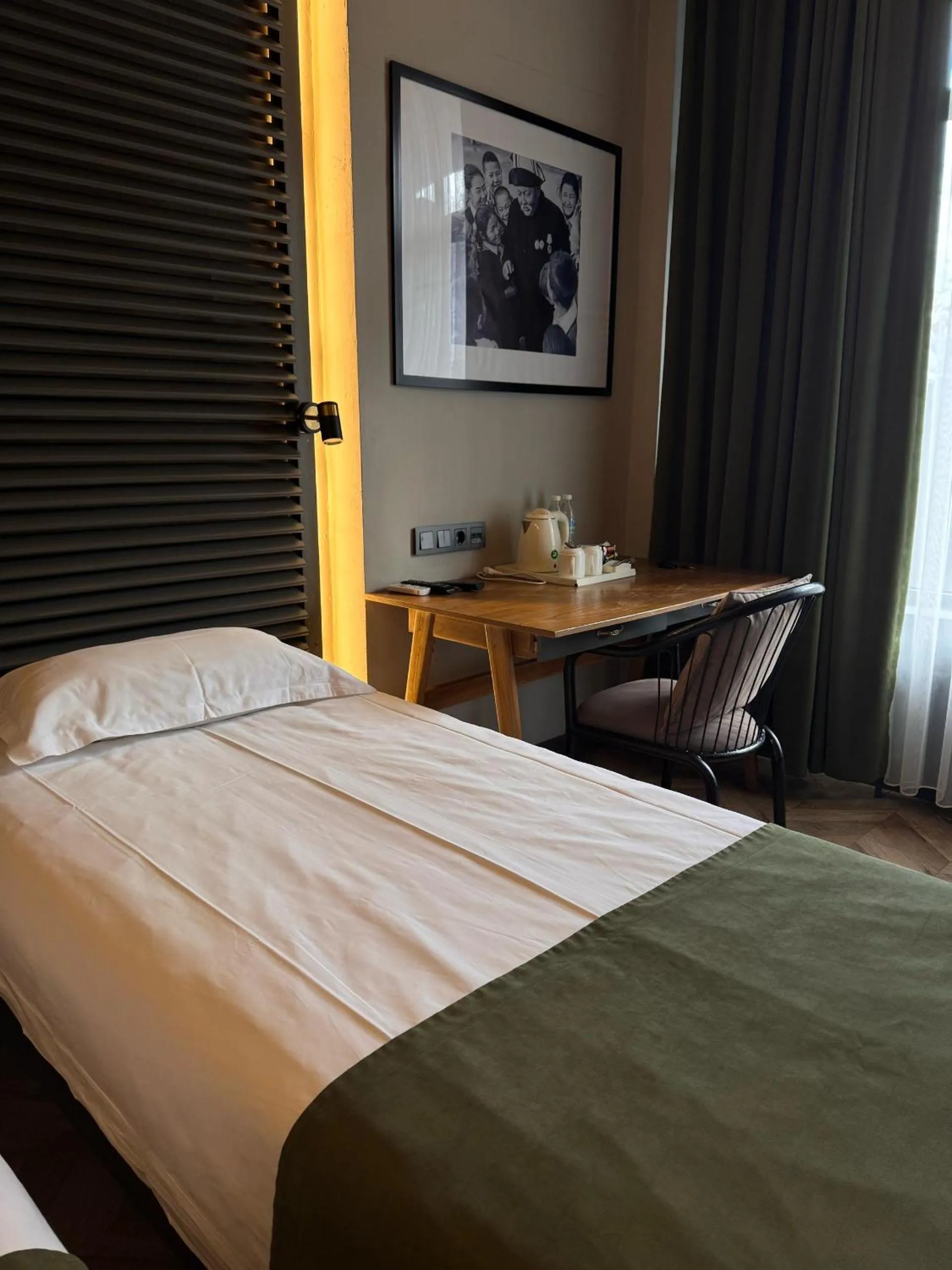 Bed in Bugu Hotel Bishkek