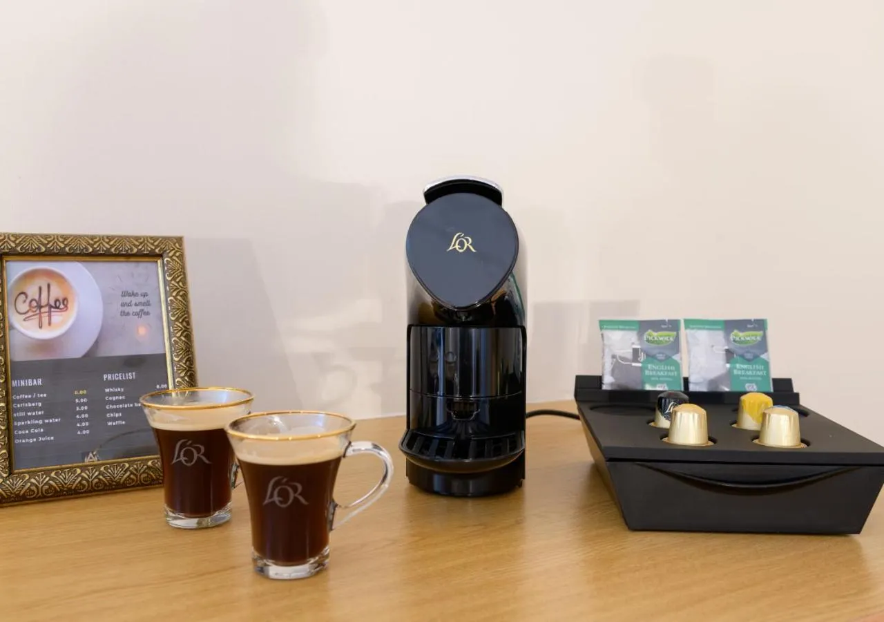 Coffee/tea facilities in Axis Hotel