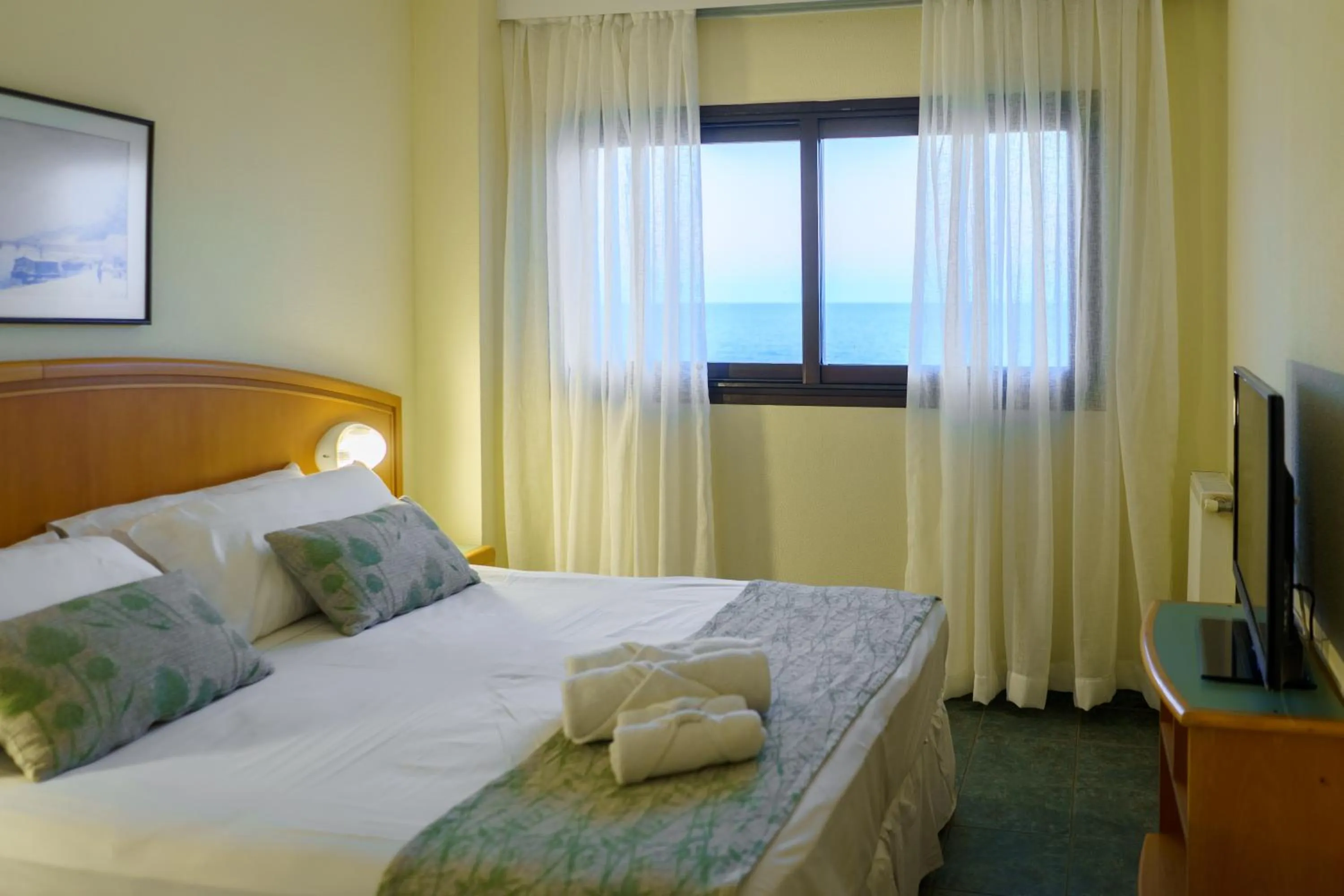 Bed in Hostal del Sol