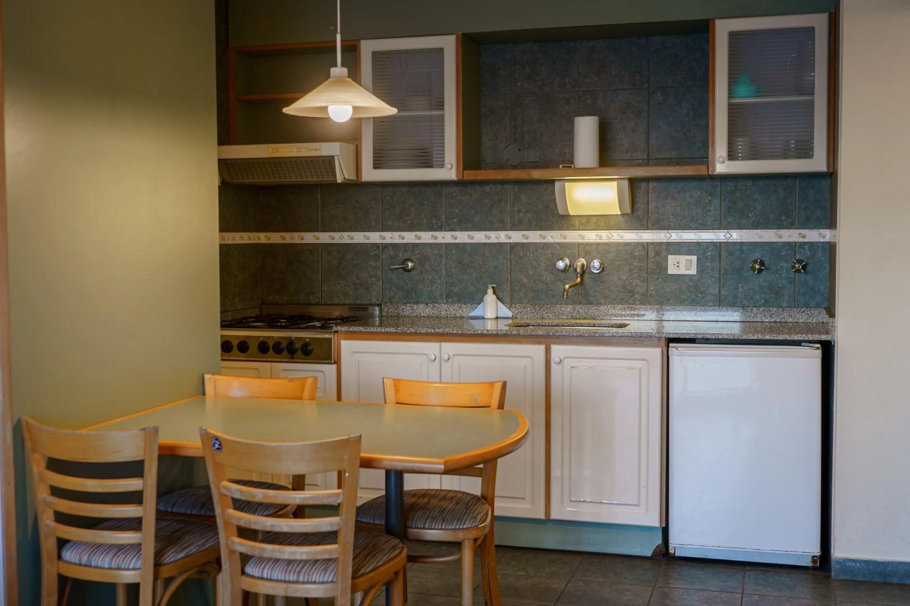 Kitchen or kitchenette in Hostal del Sol