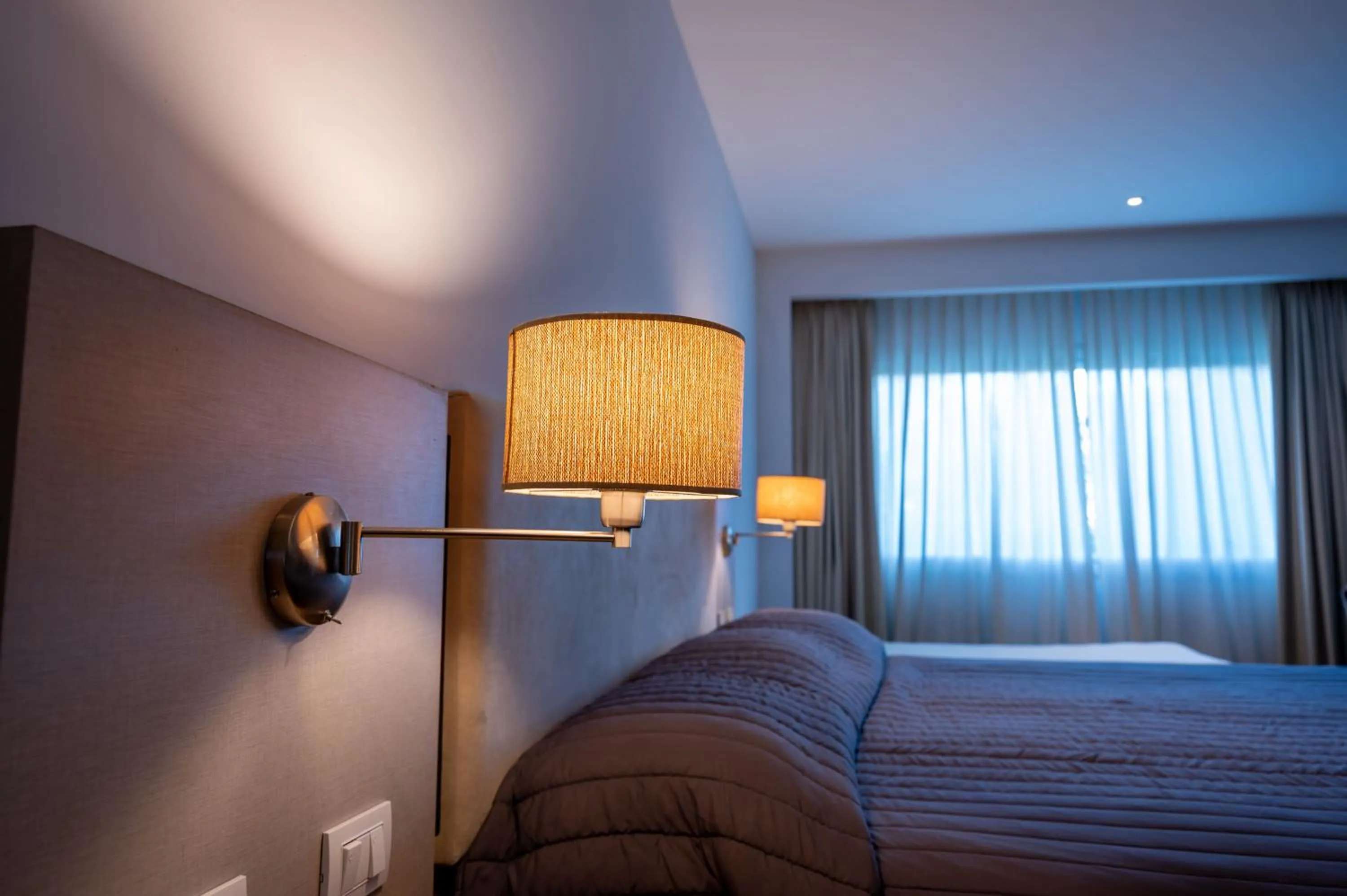 Bed in Howard Johnson Plaza Villa Carlos Paz