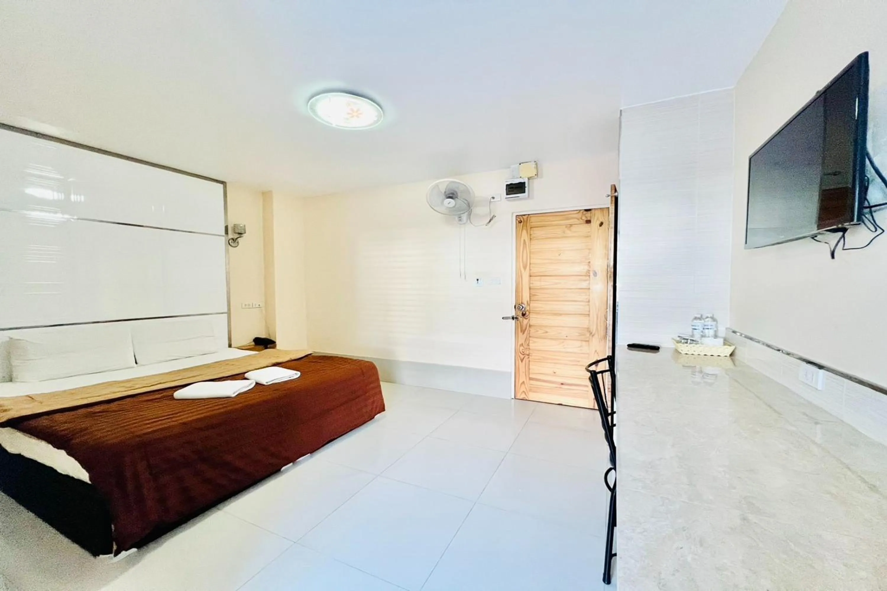 Photo of the whole room, Bed in Veerakit Grand Hotel