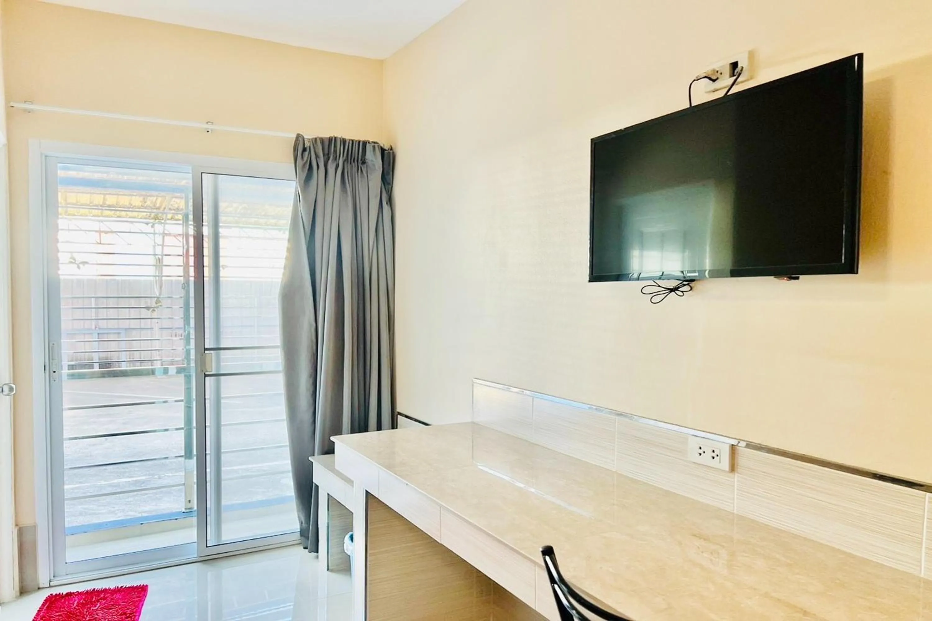 TV and multimedia in Veerakit Grand Hotel