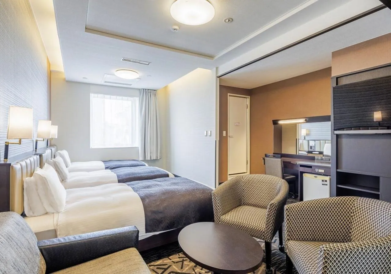 Bed in APA Hotel Miyazaki Nobeoka Chuo