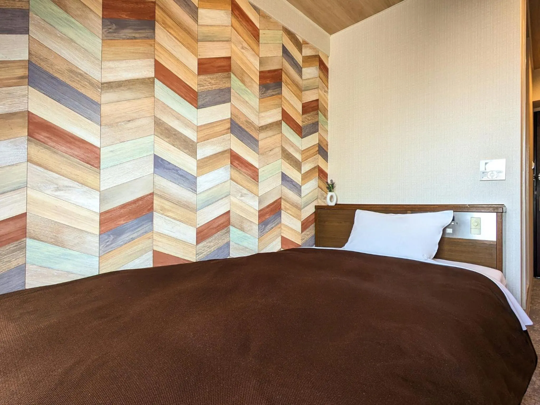 Bed in Hotel New Gaea Ube