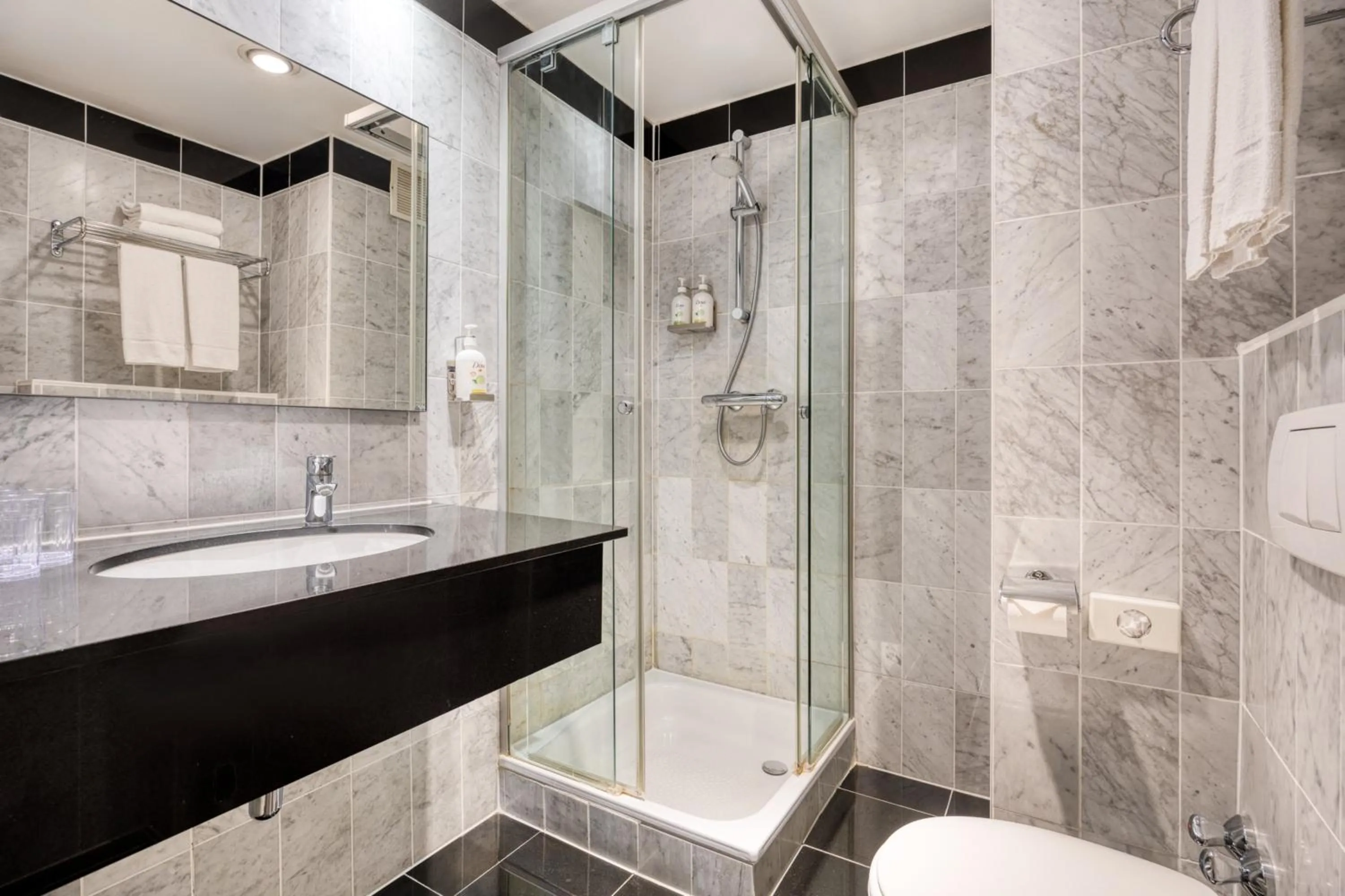 Bathroom in Holiday Inn Brussels Schuman by IHG
