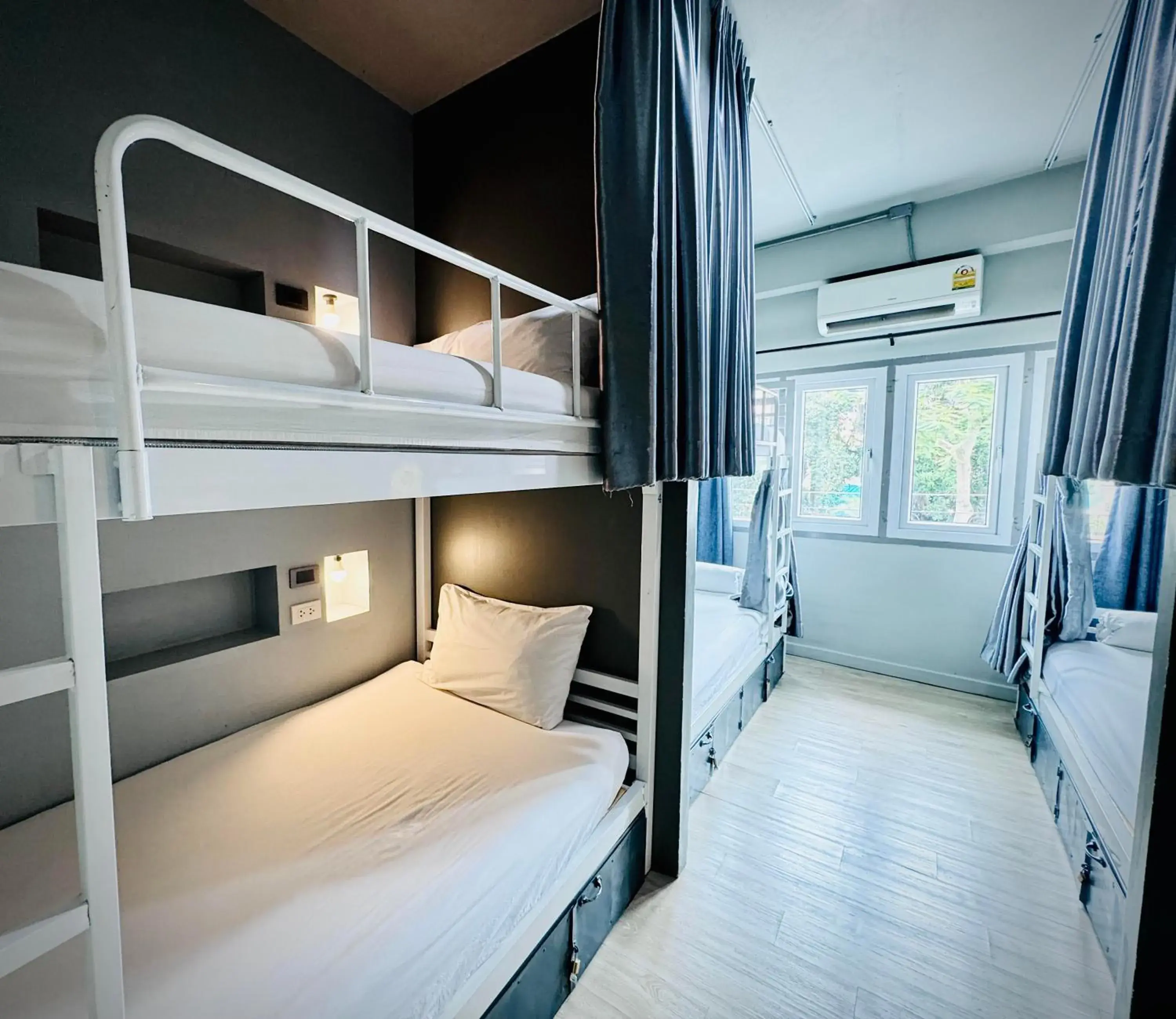 Bed in 8-Bed Mixed Dormitory Room in The August Hostel Bed in 8-Bed Mixed Dormitory Room in The August Hostel