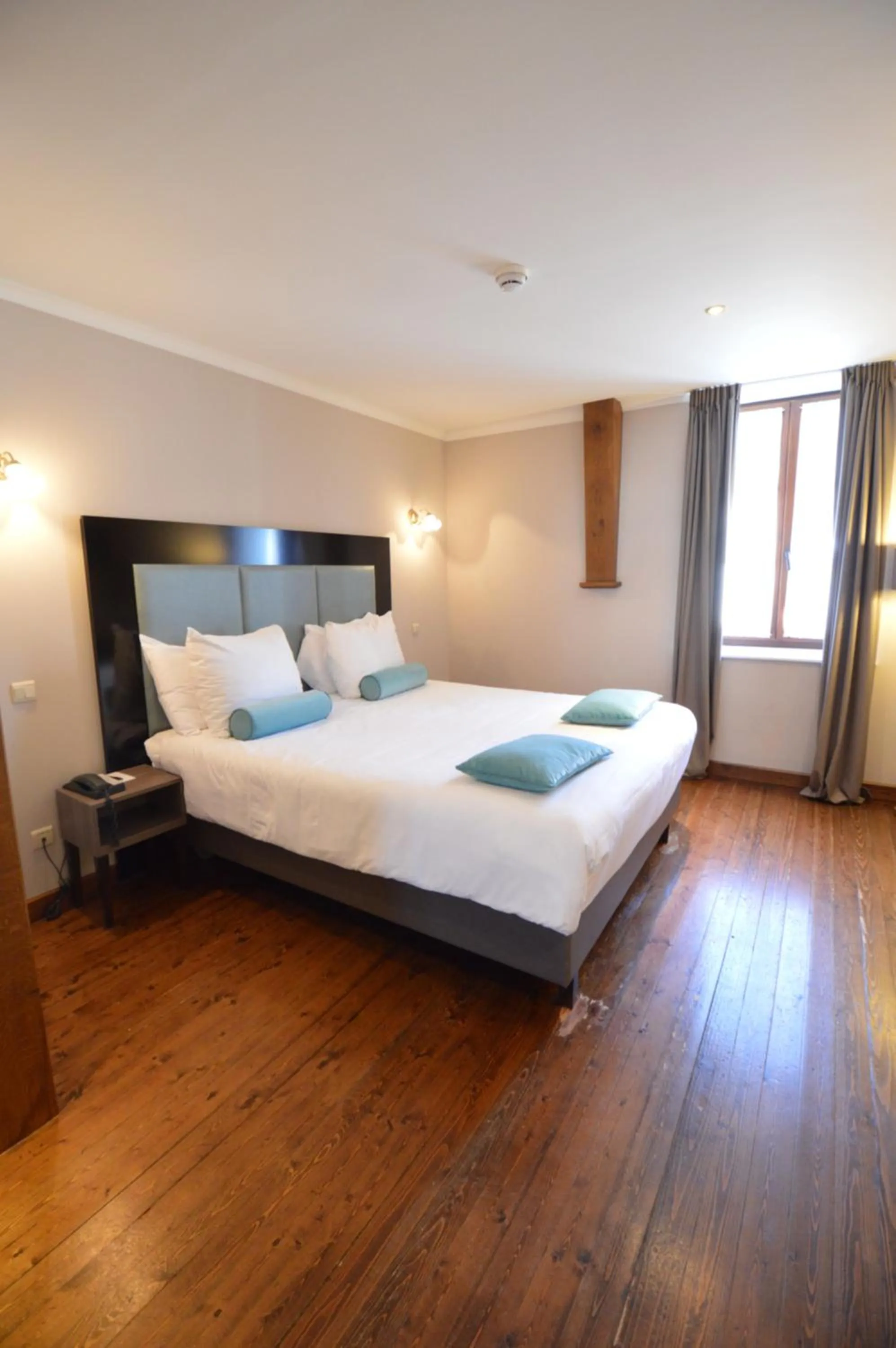 Bed in Hotel de la Poste - Relais de Napoleon III