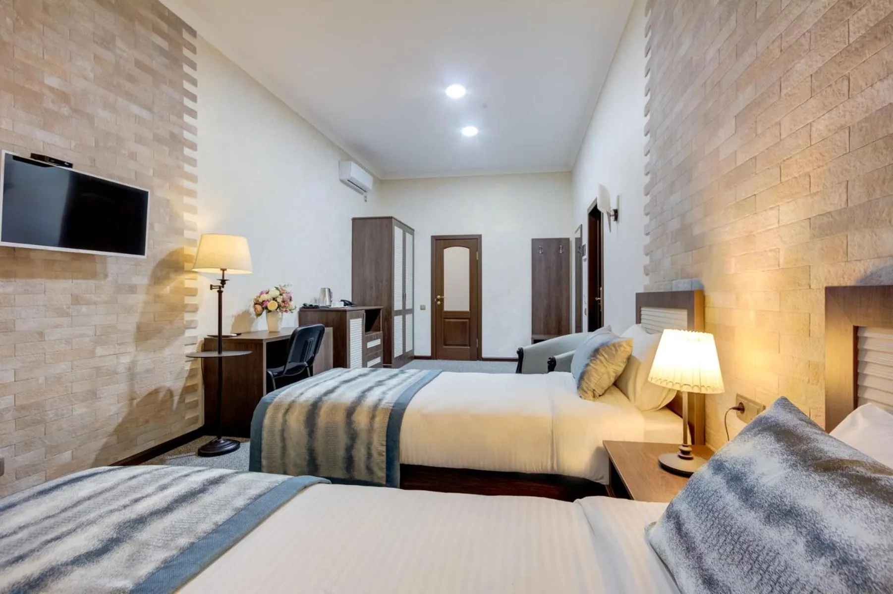 Photo of the whole room, Bed in Bishkek Centrum Hotel