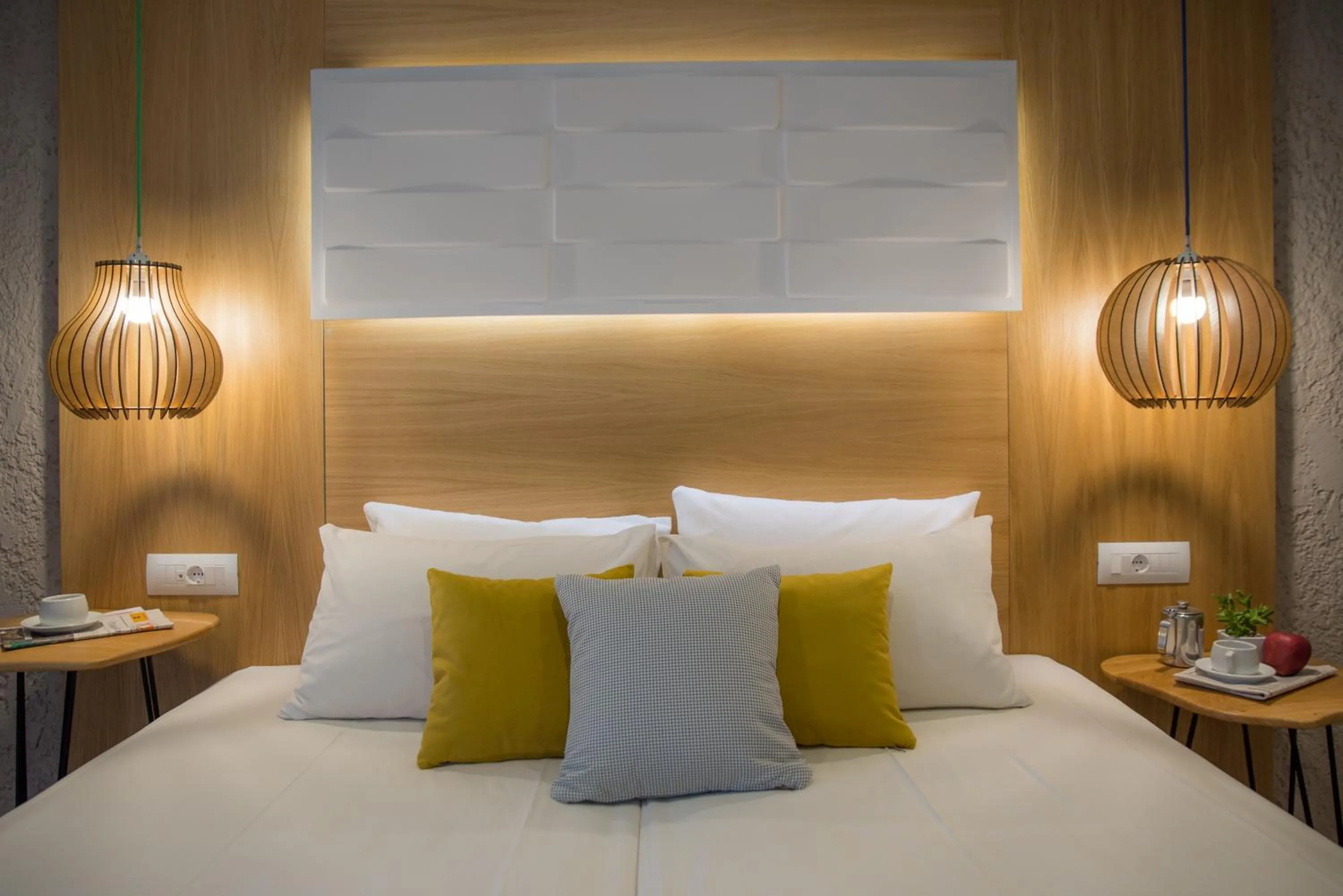 Bed in Sunshine Boutique Hotel by Estia