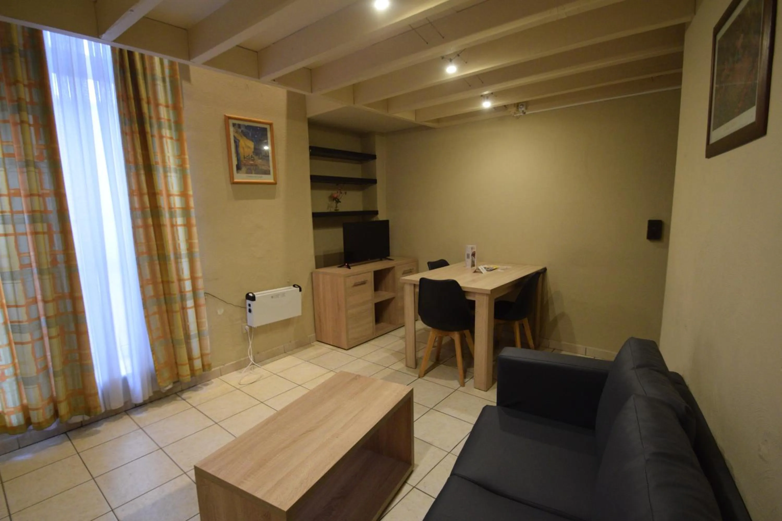 Seating area in Condo Gardens Leuven