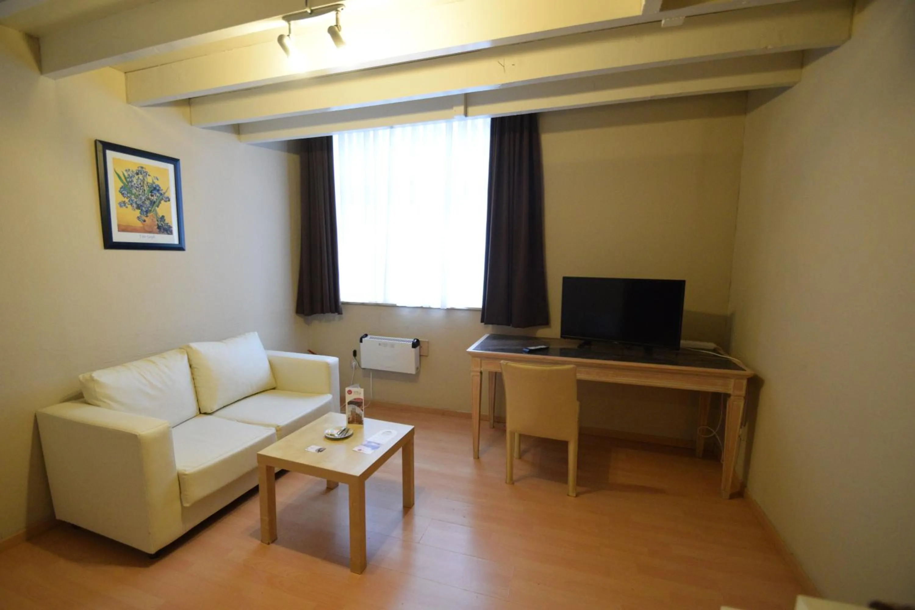 Seating area in Condo Gardens Leuven