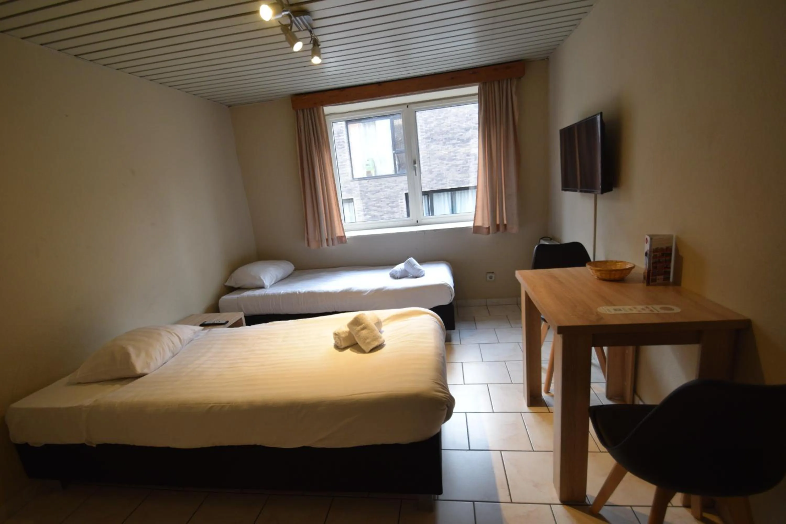 Bed in Condo Gardens Leuven