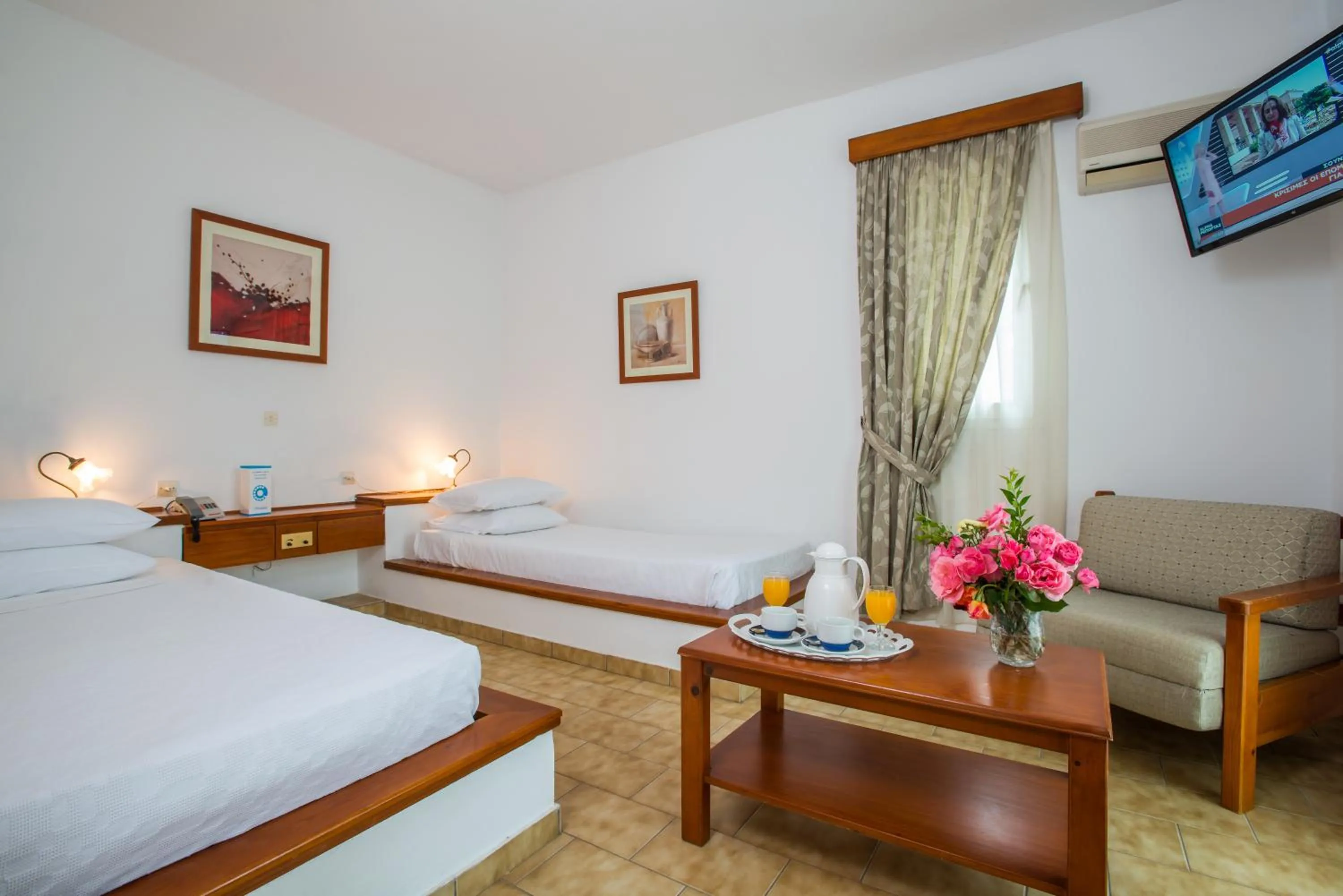 Bedroom in Delfinia Hotel & Bungalows