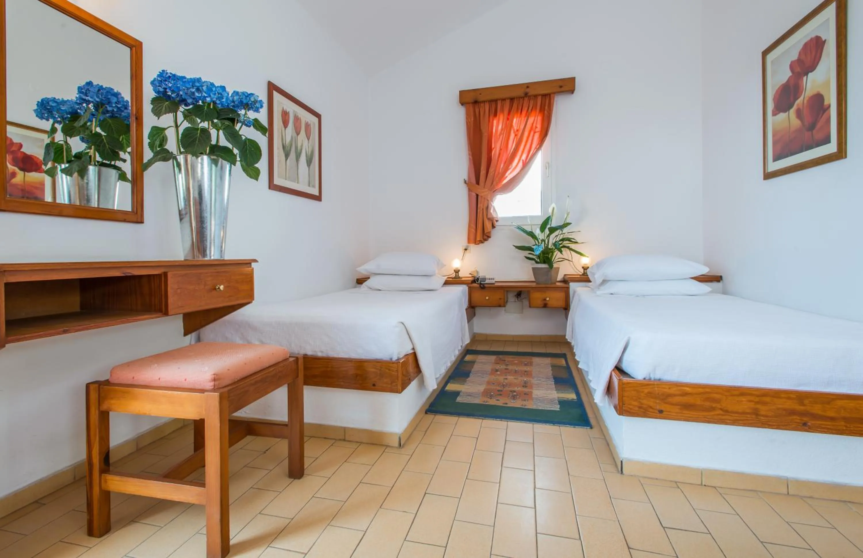 Bedroom in Delfinia Hotel & Bungalows