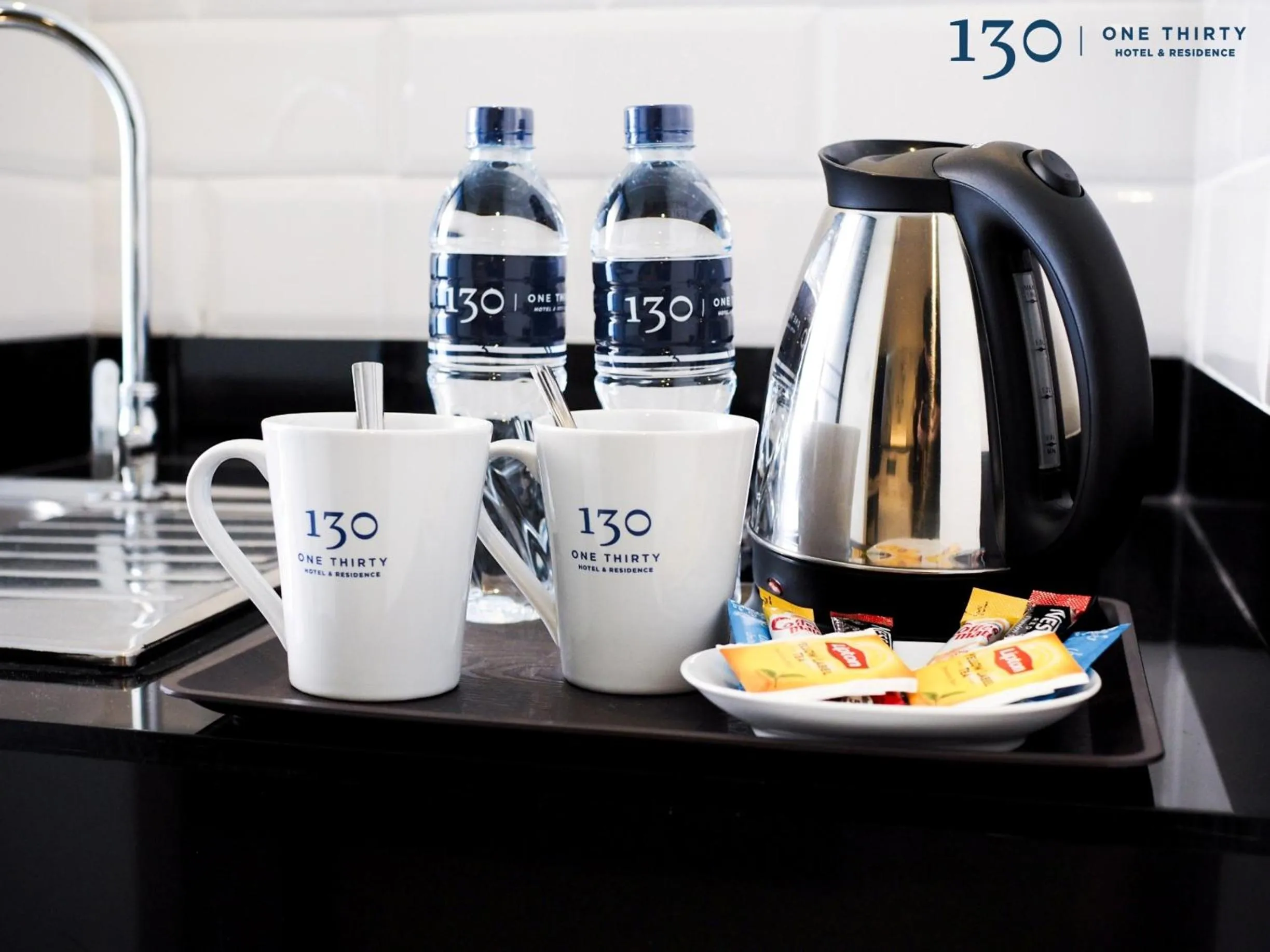 Property logo or sign in 130 Hotel & Residence Bangkok