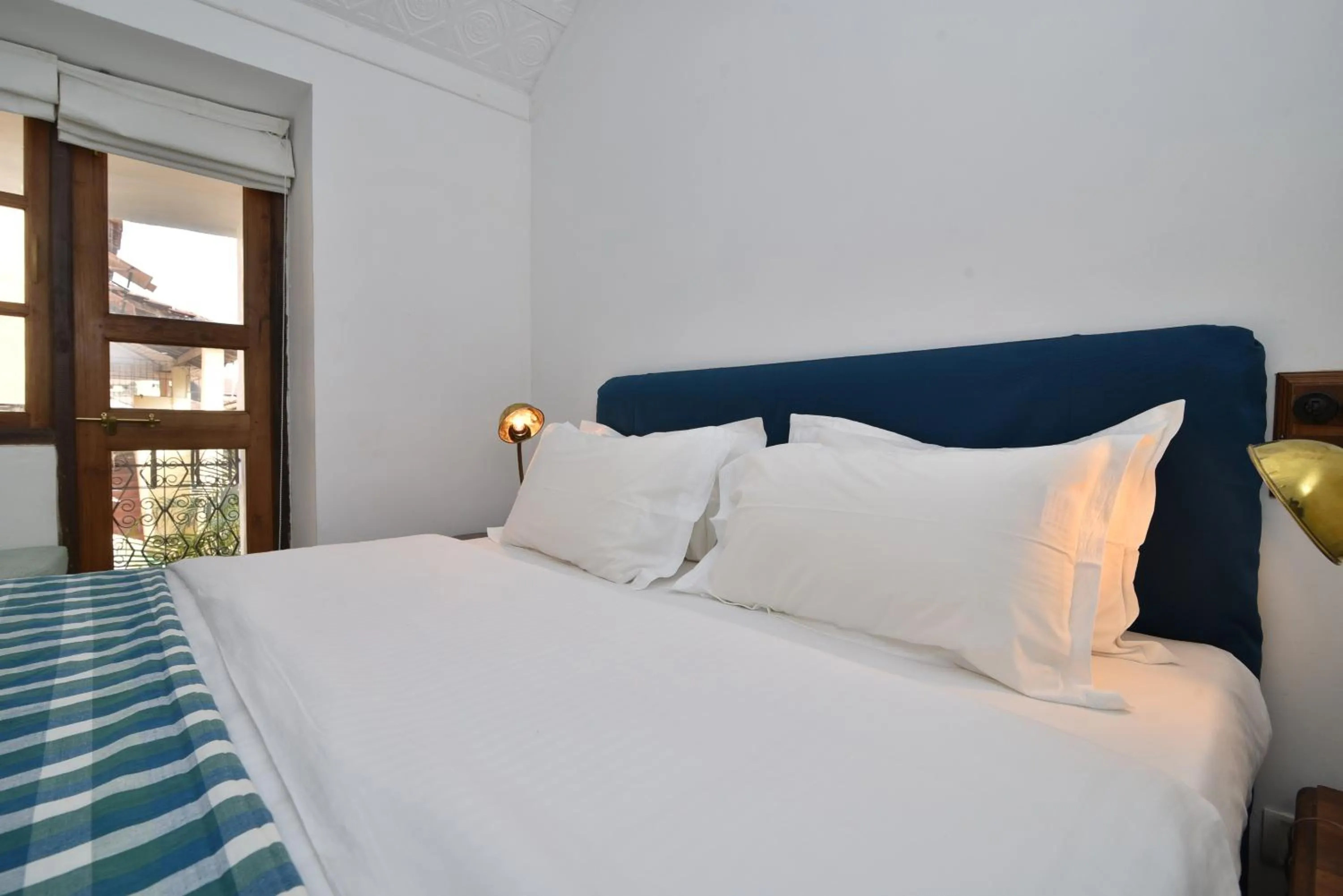 Bed in Mateus Boutique Hotel