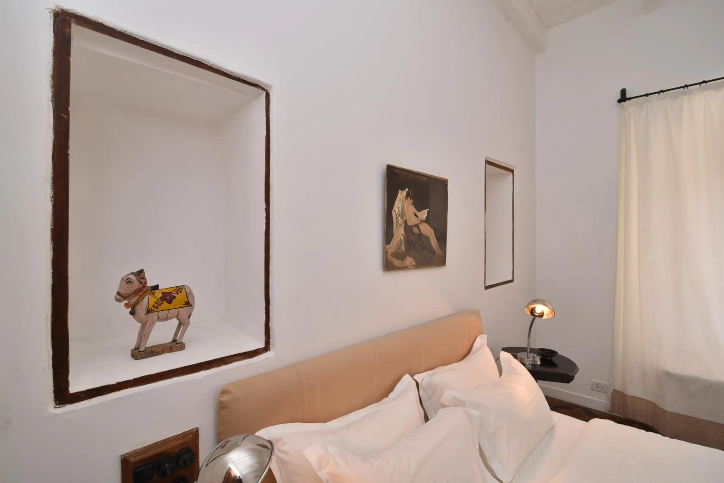 Bed in Mateus Boutique Hotel