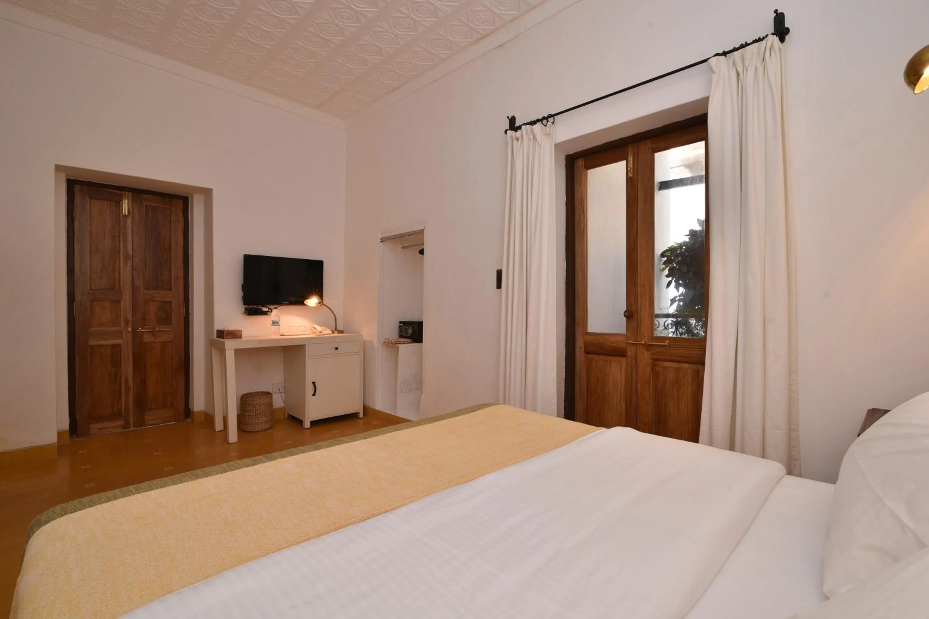 Bed in Mateus Boutique Hotel