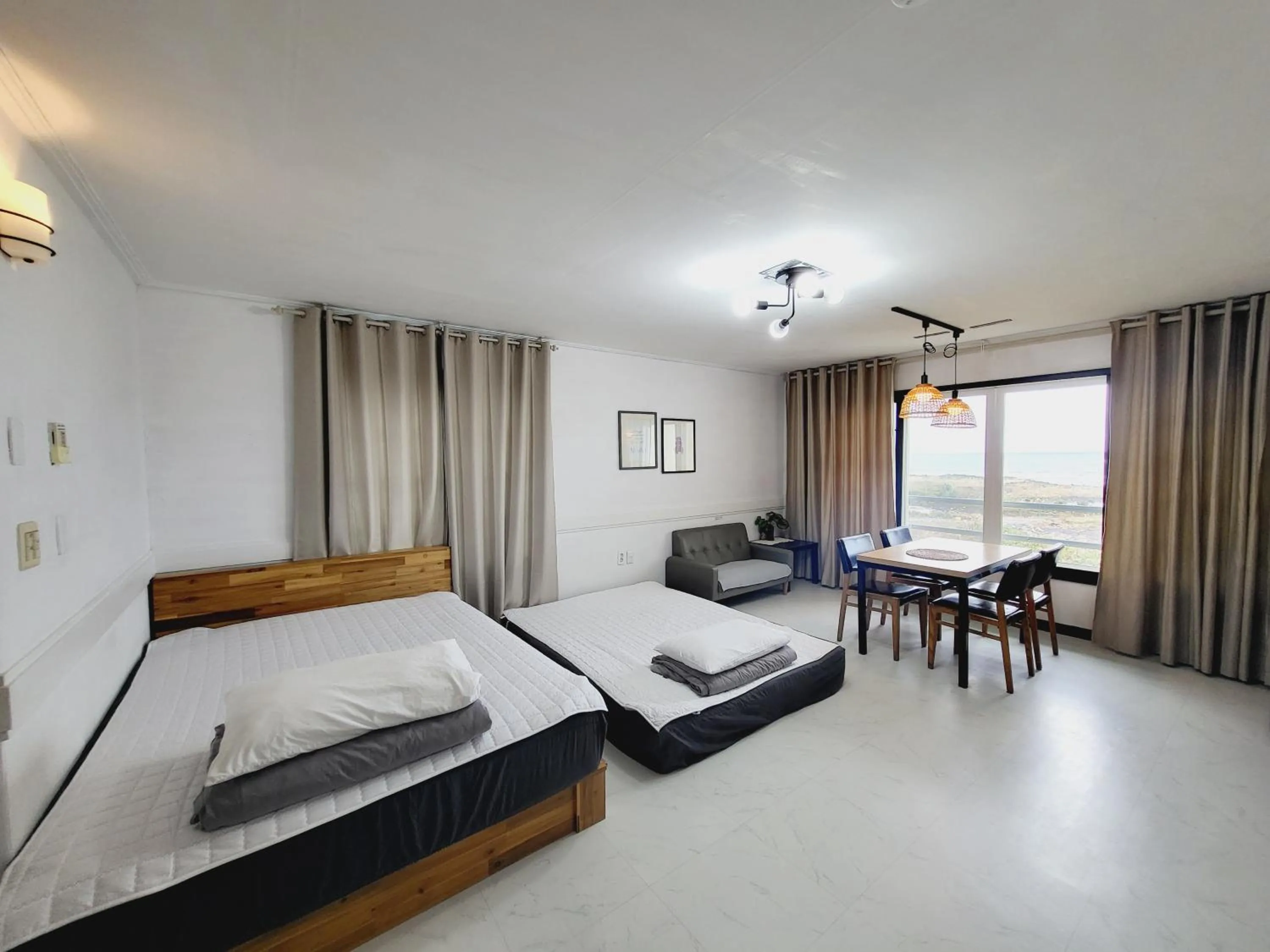 Bed in Morning Beach Pension