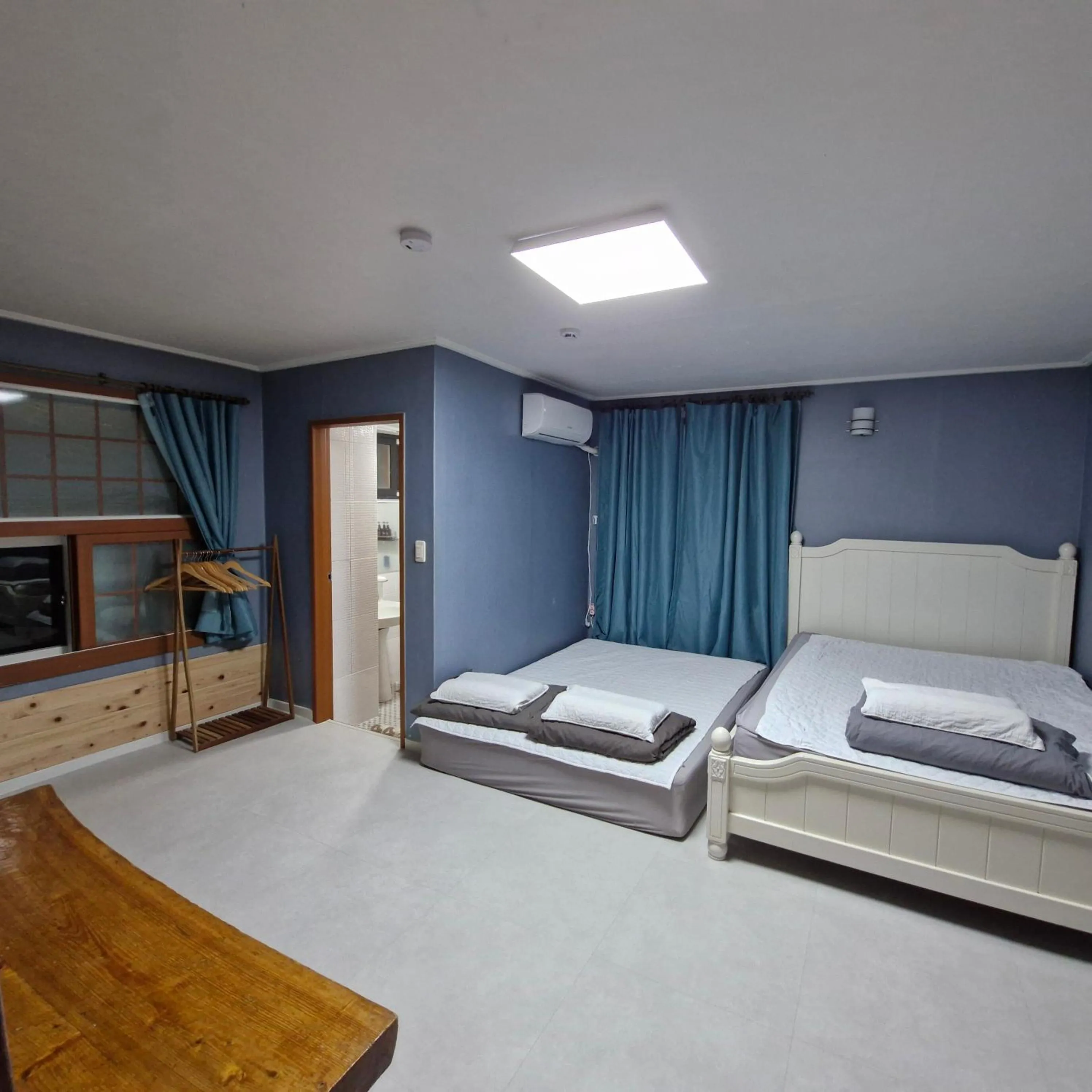 Bed in Morning Beach Pension