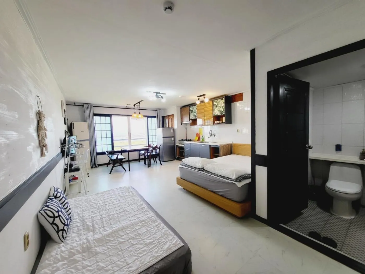 Bed in Morning Beach Pension