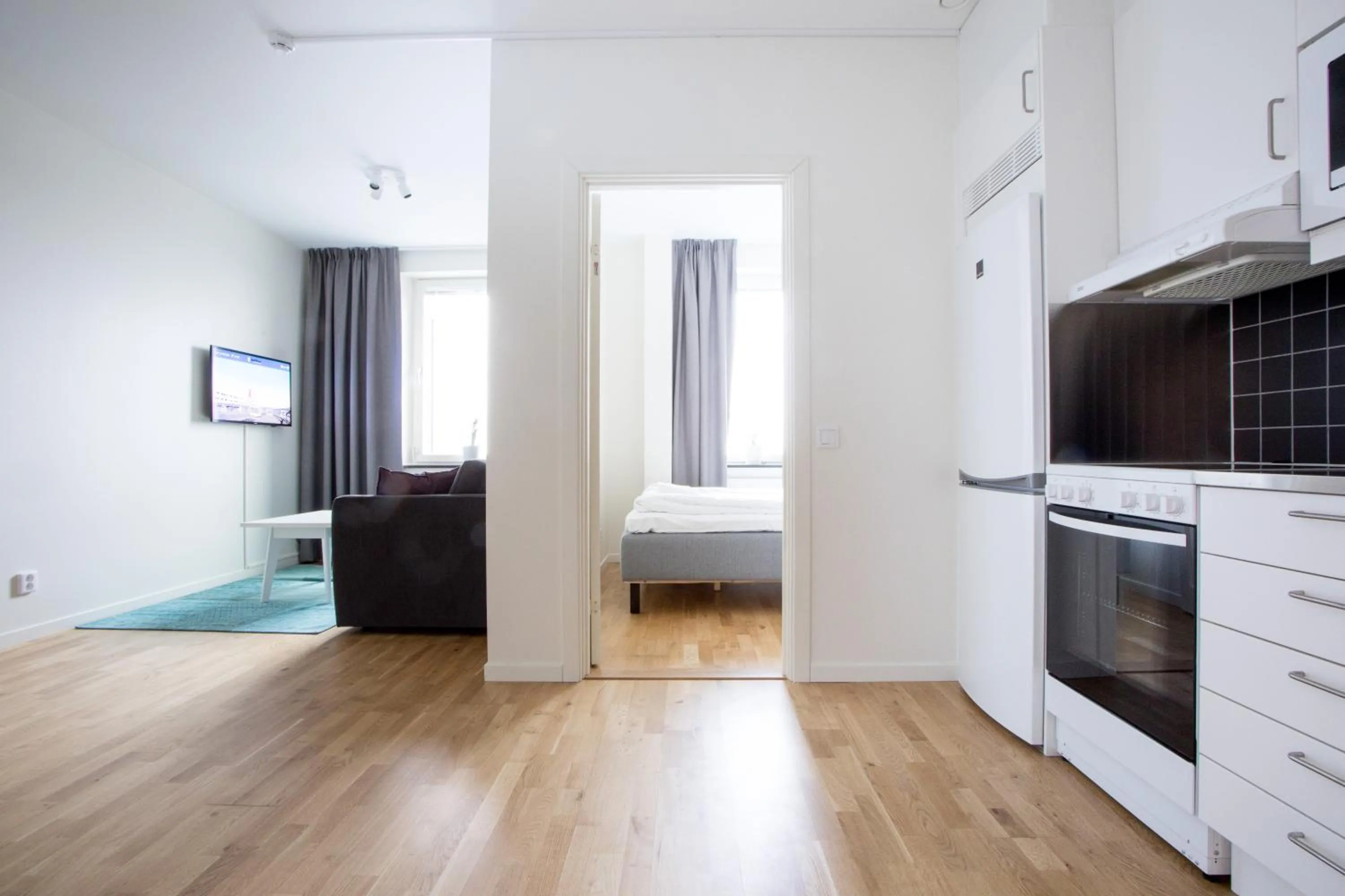 Living room, Bed in ApartDirect Linköping Arena