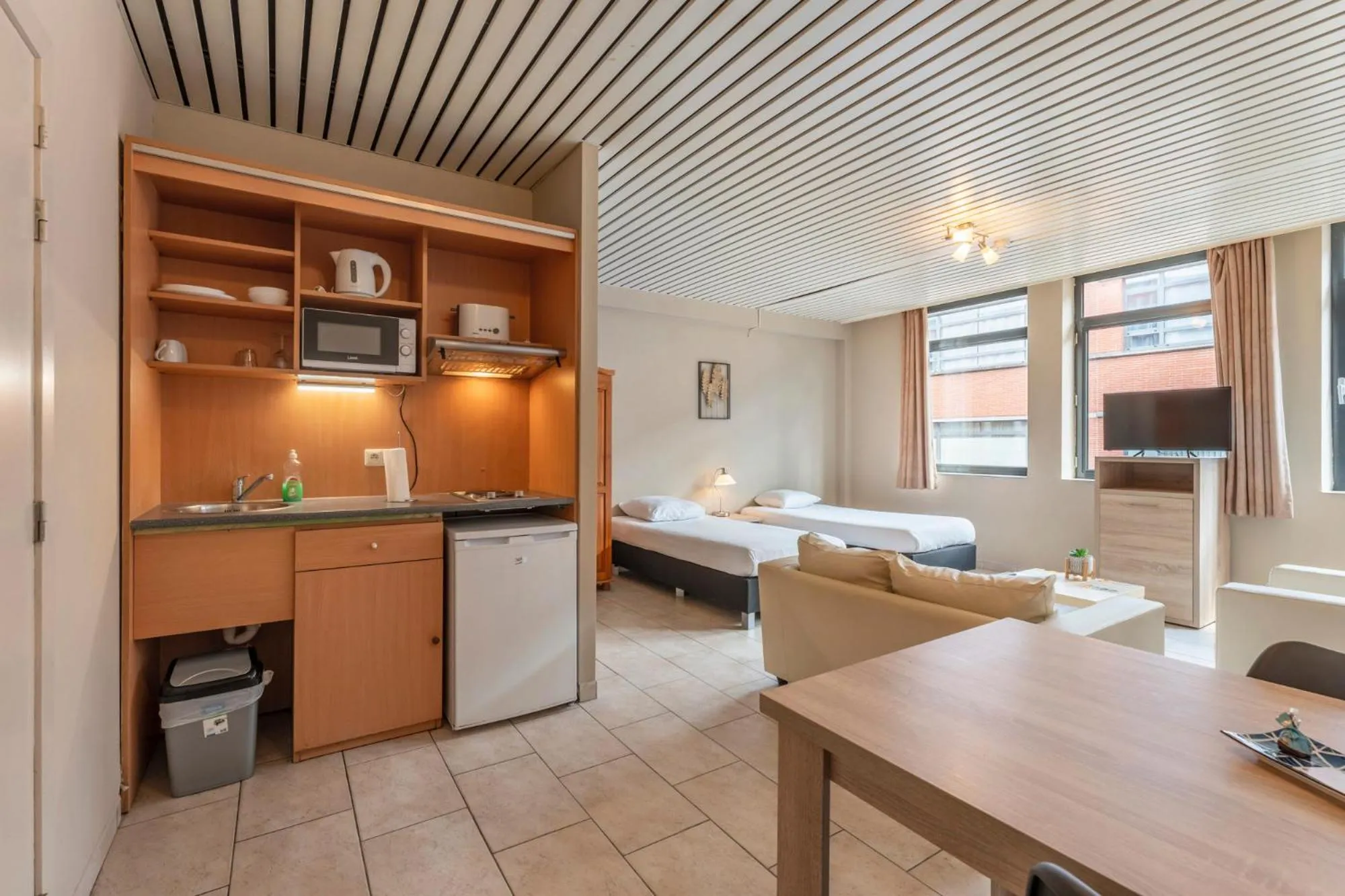 Bed in Condo Gardens Brussels