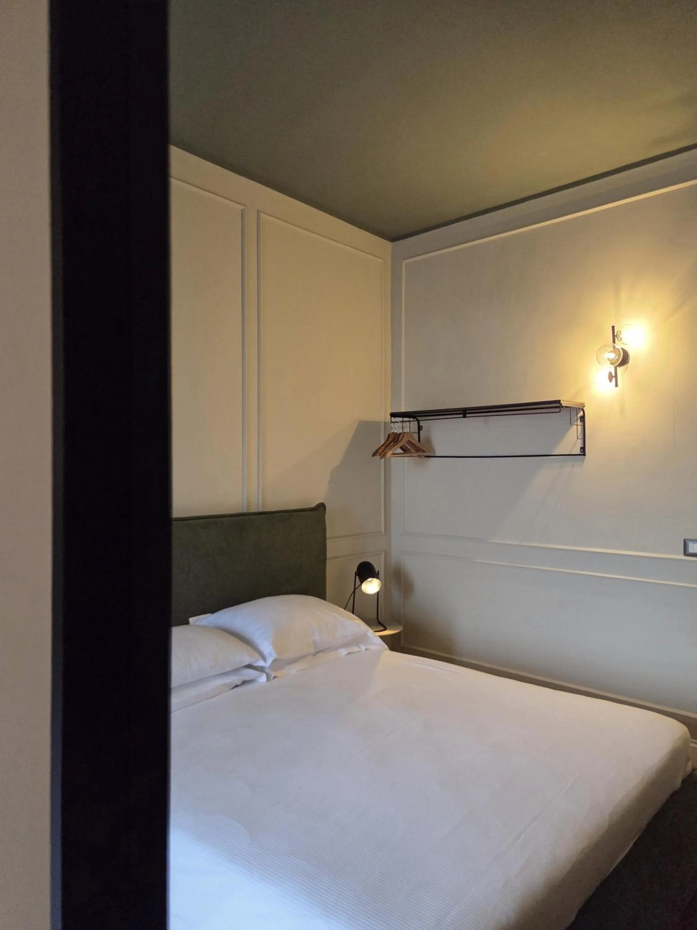 Bed in Corso Italia Rooms