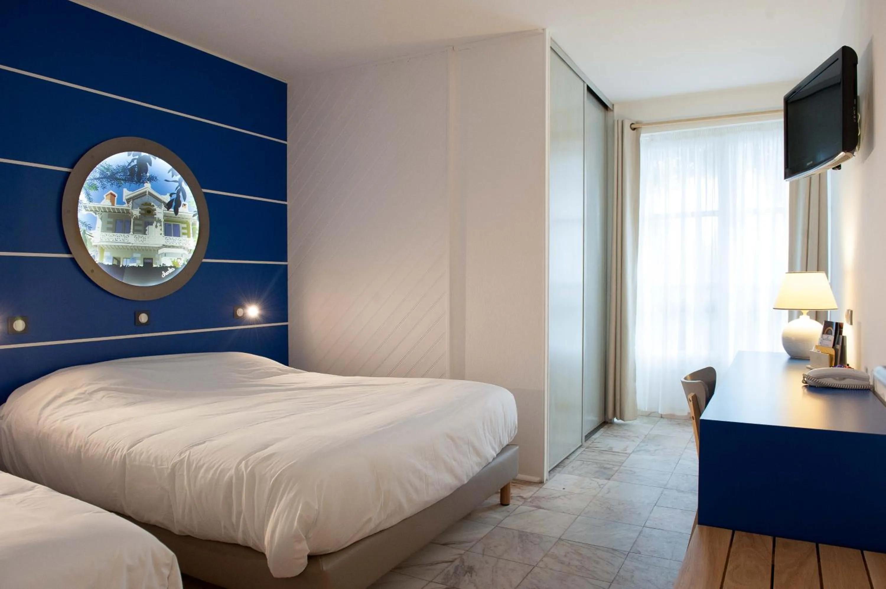 Photo of the whole room, Bed in Hôtel Le Dauphin