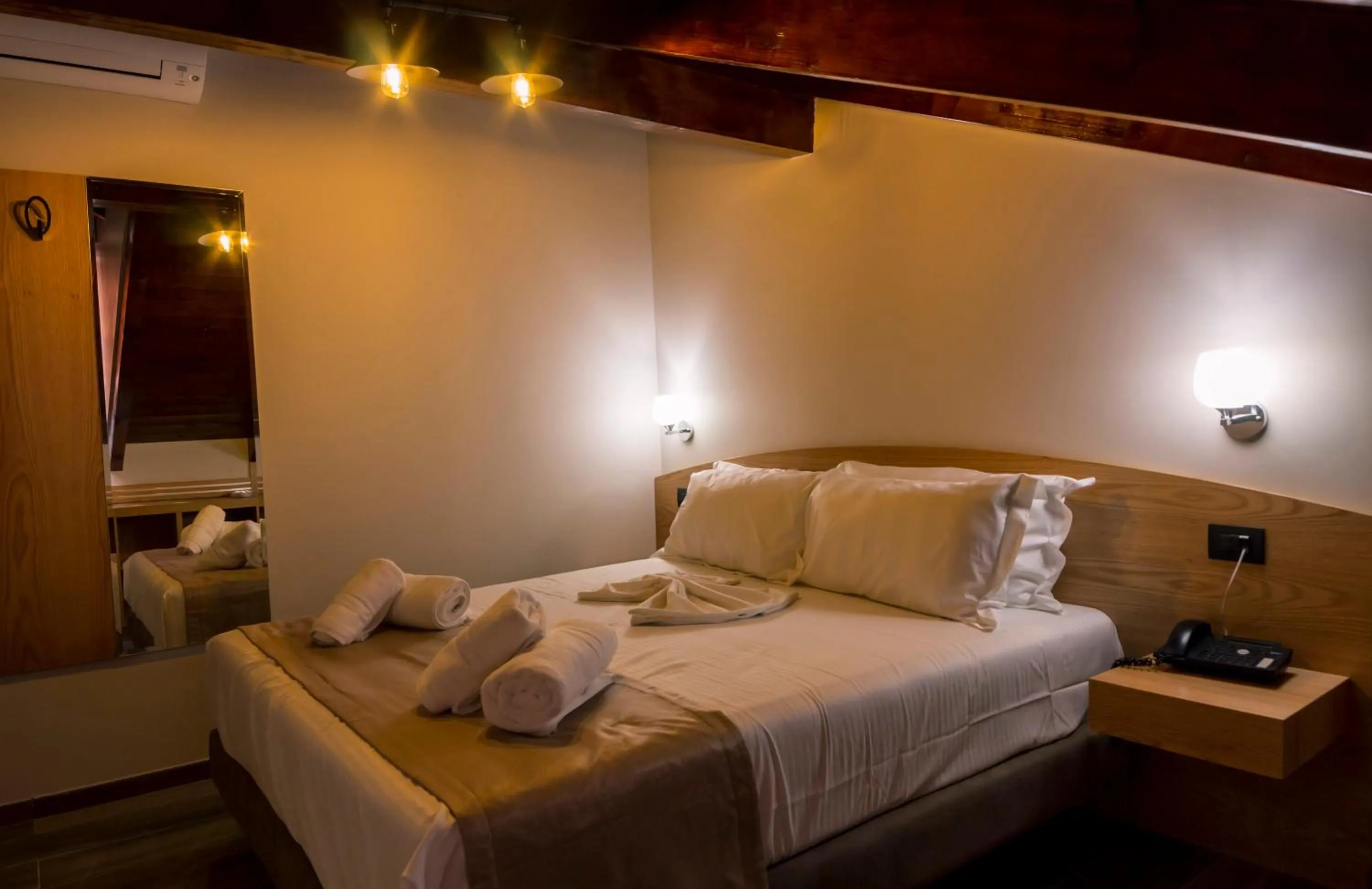 Bed in Hotel Pandora Residence