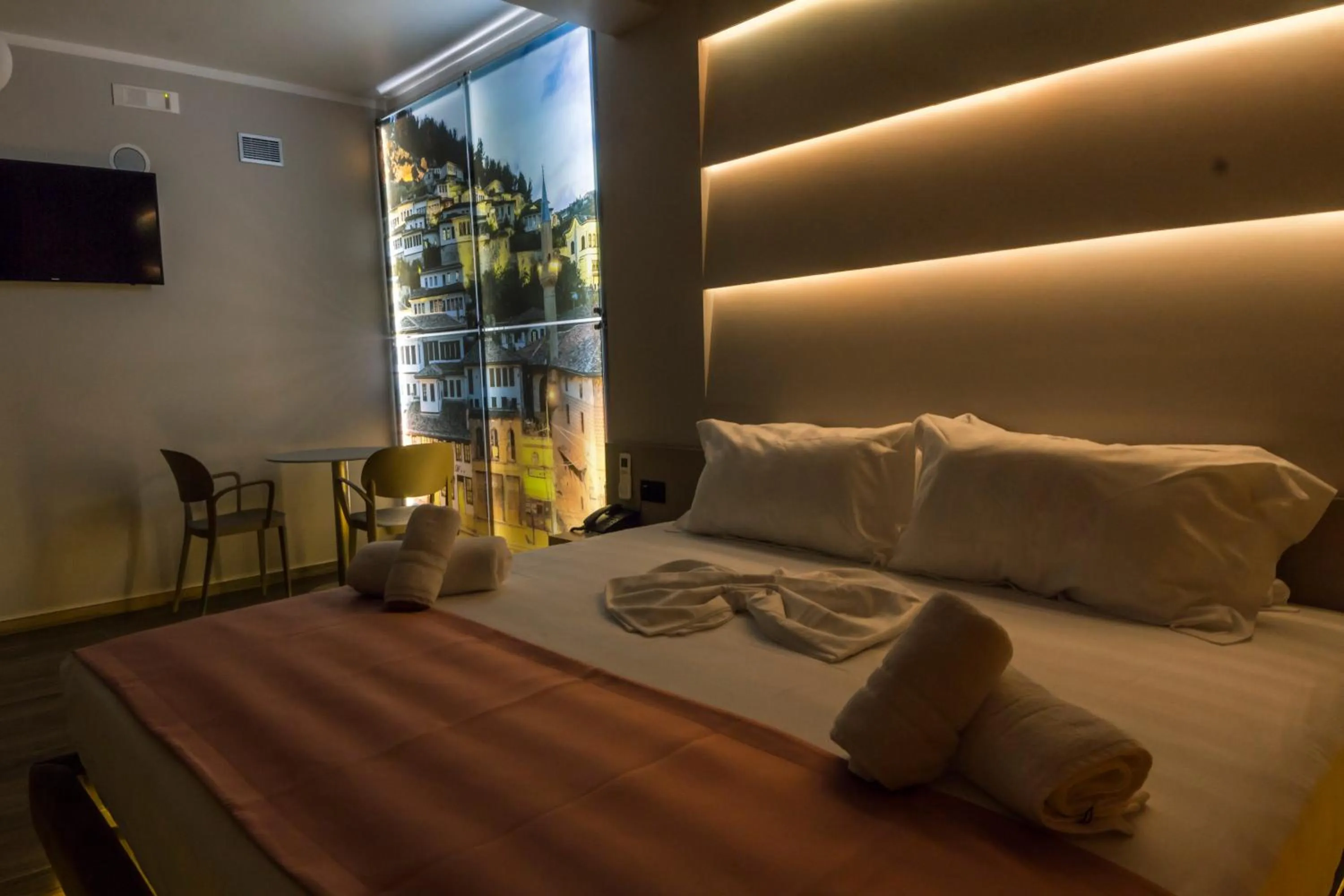 Seating area, Bed in Hotel Pandora Residence