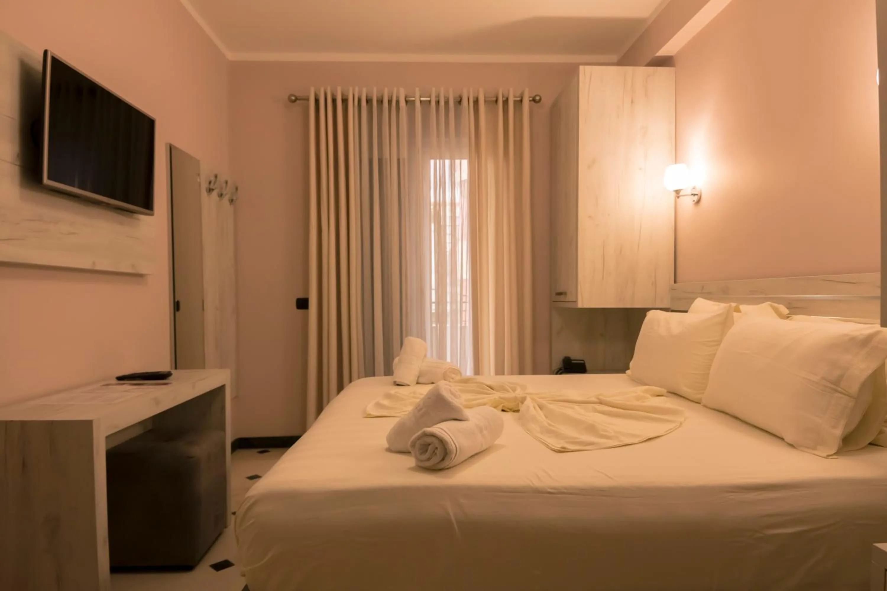 Bed in Hotel Pandora Residence