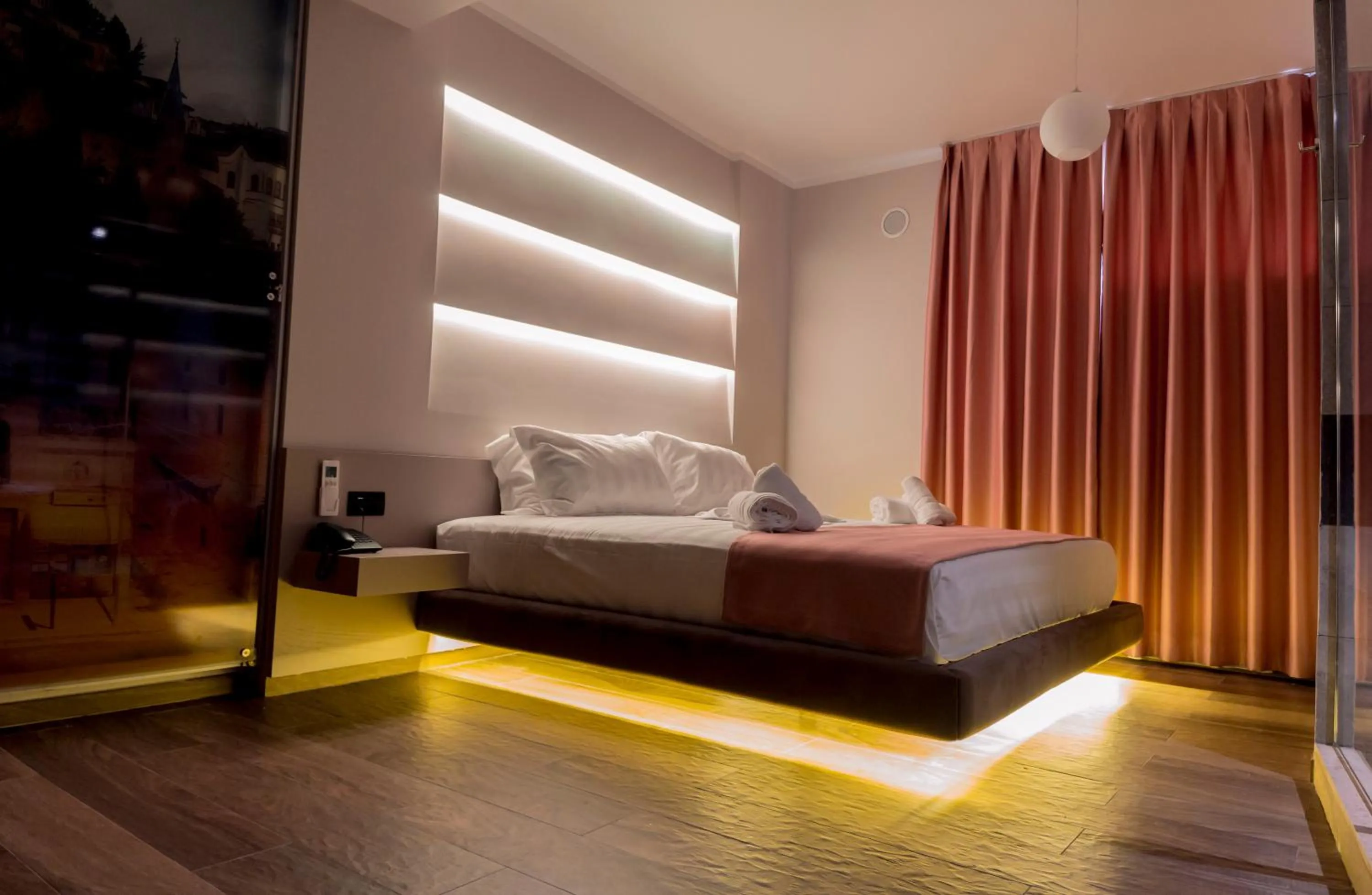 Bed in Hotel Pandora Residence