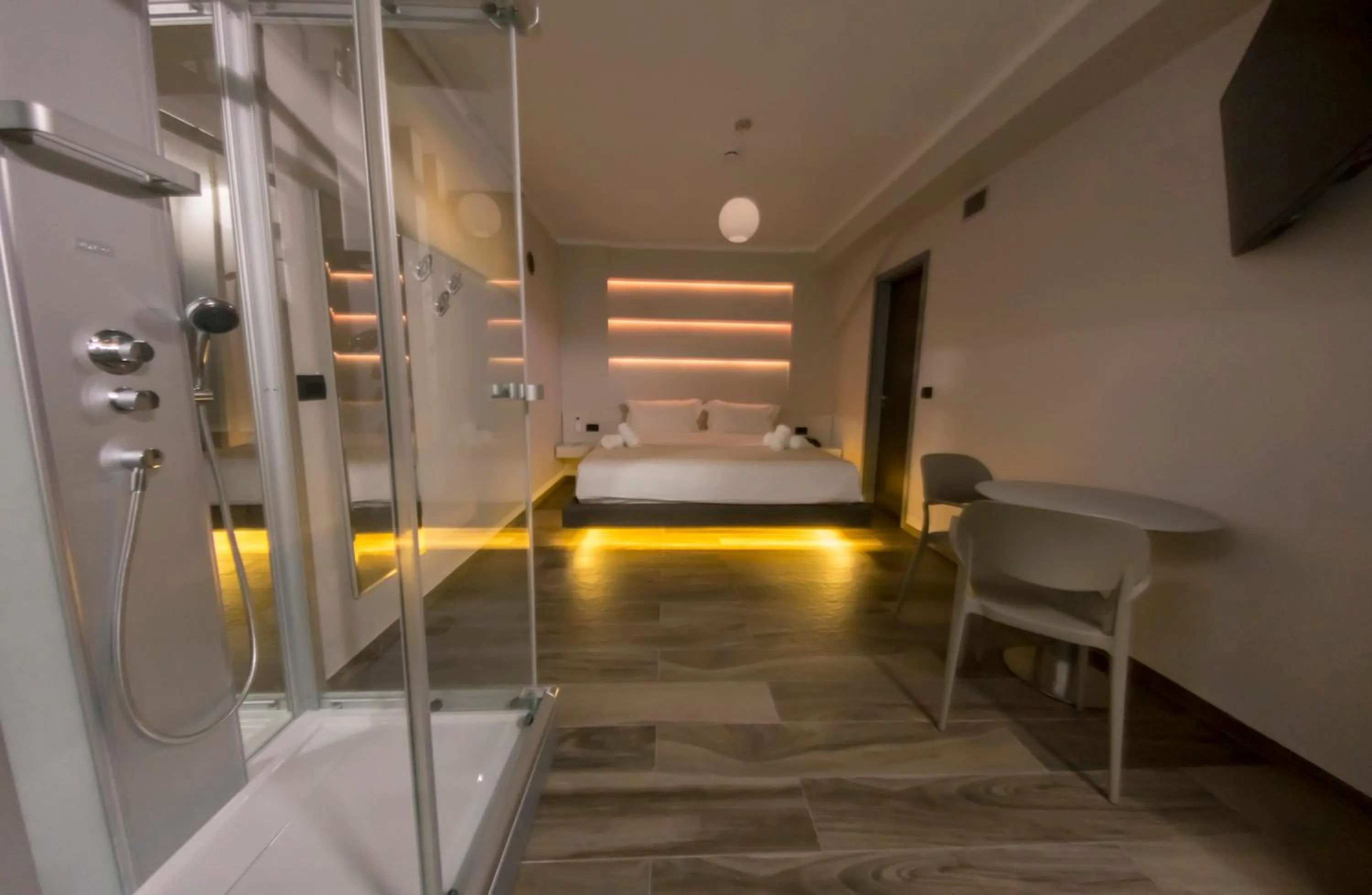 Bed in Hotel Pandora Residence