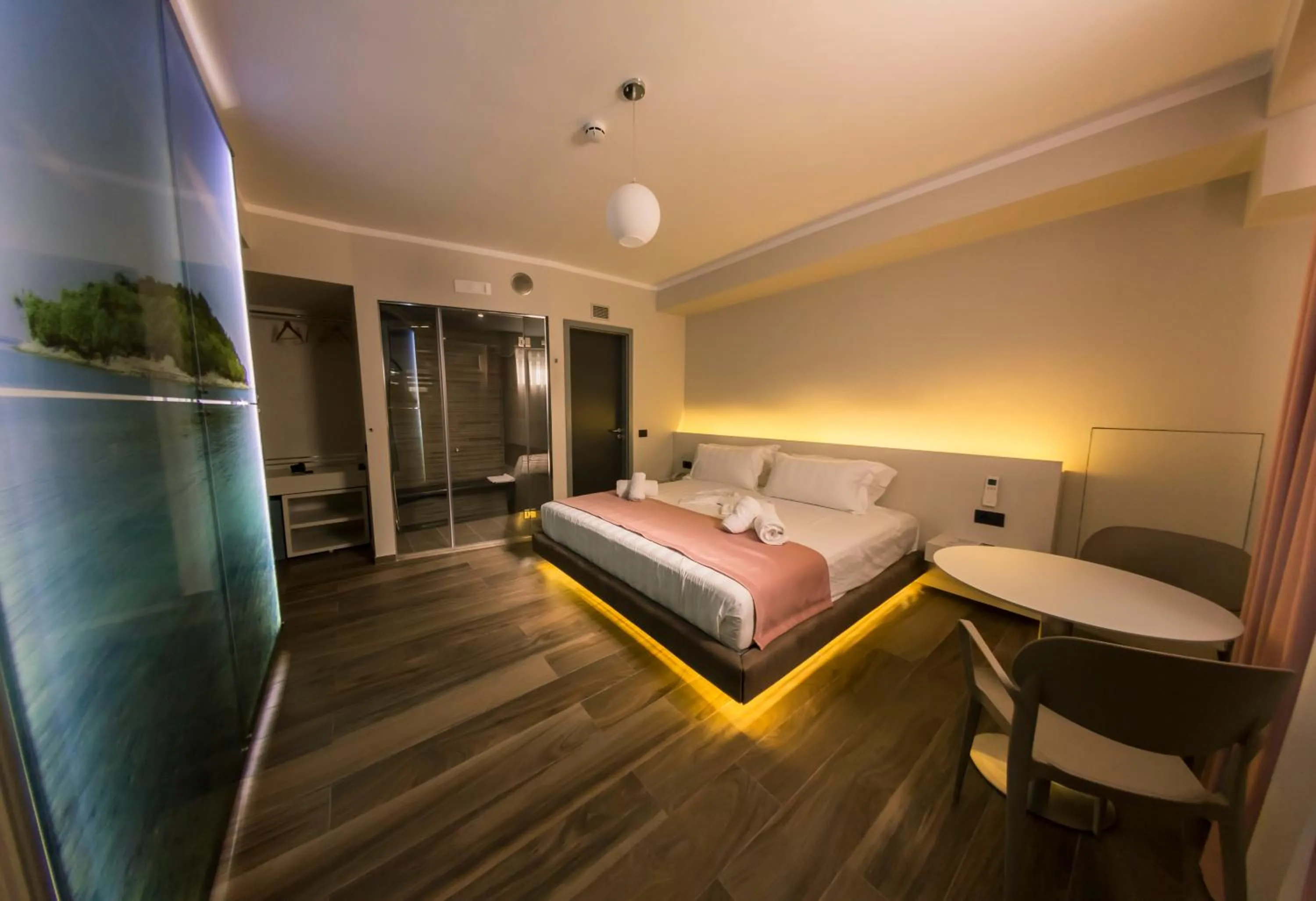 Bed in Hotel Pandora Residence