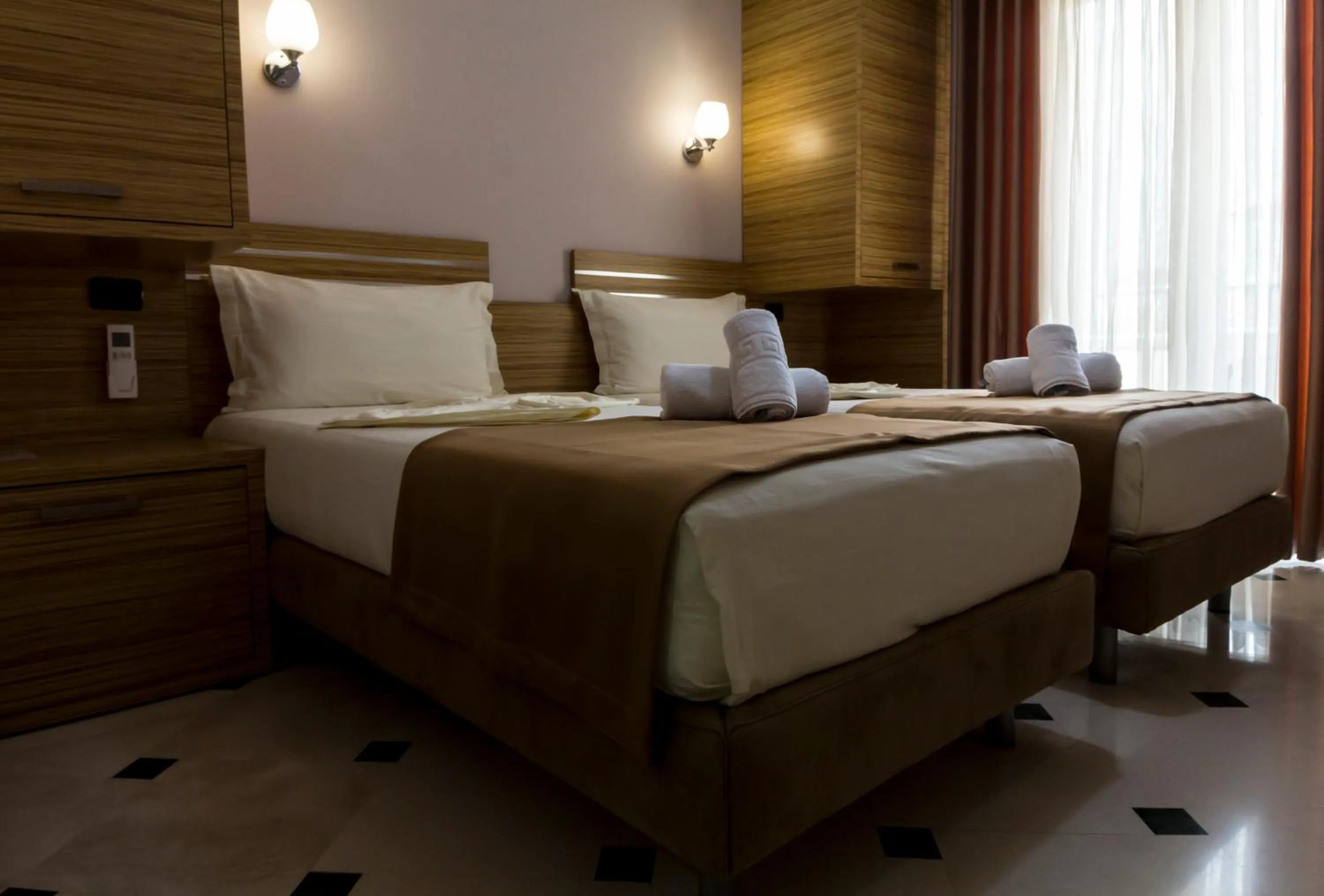 Bed in Hotel Pandora Residence