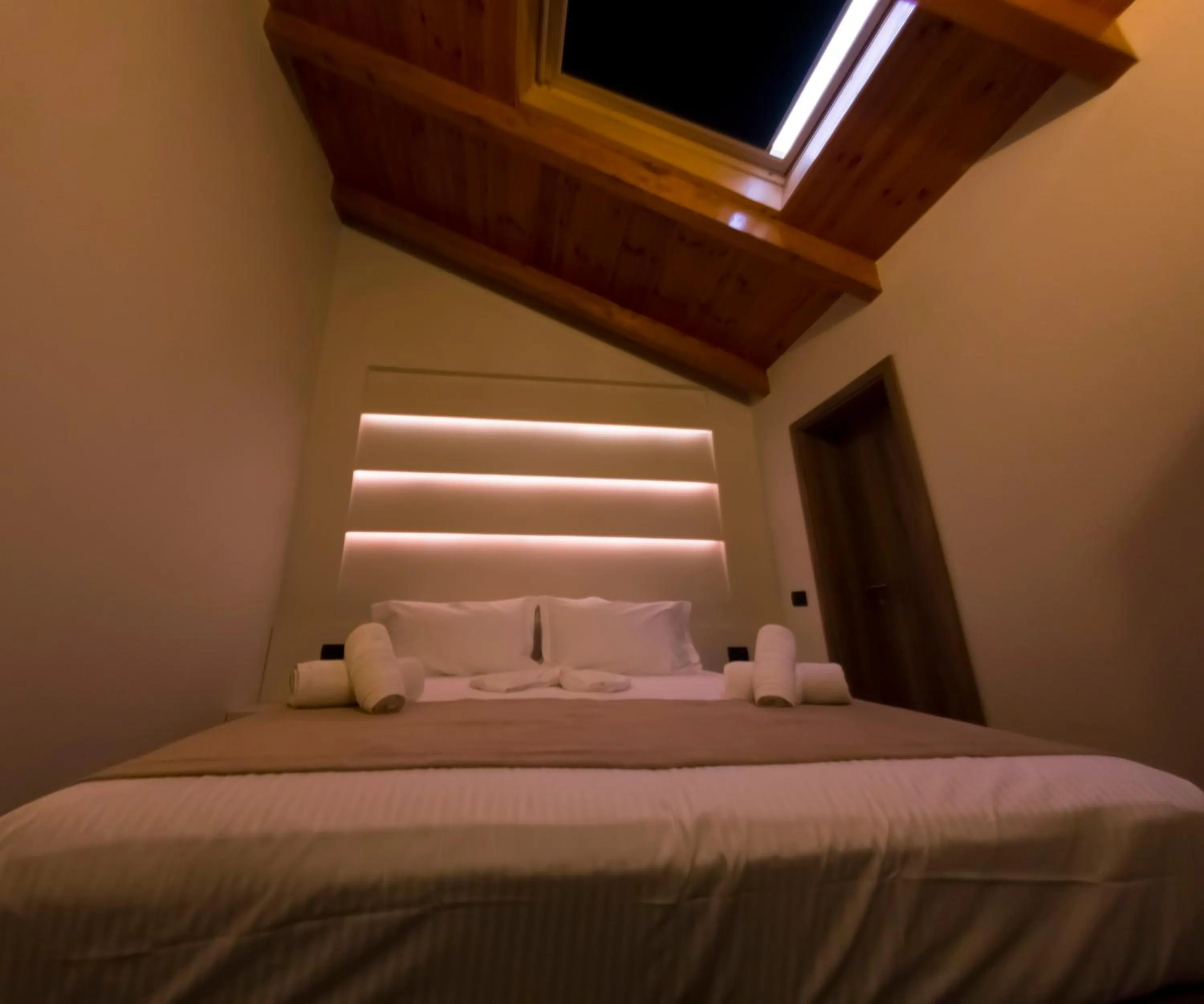 Bed in Hotel Pandora Residence