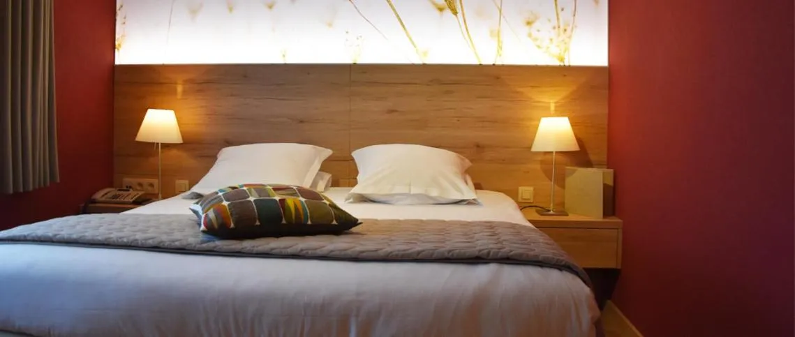 Bed in Hostellerie du Peiffeschof, The Originals Relais