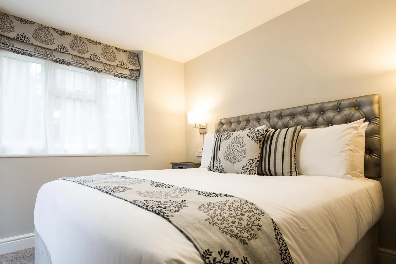 Bed in The Maple Manor Hotel